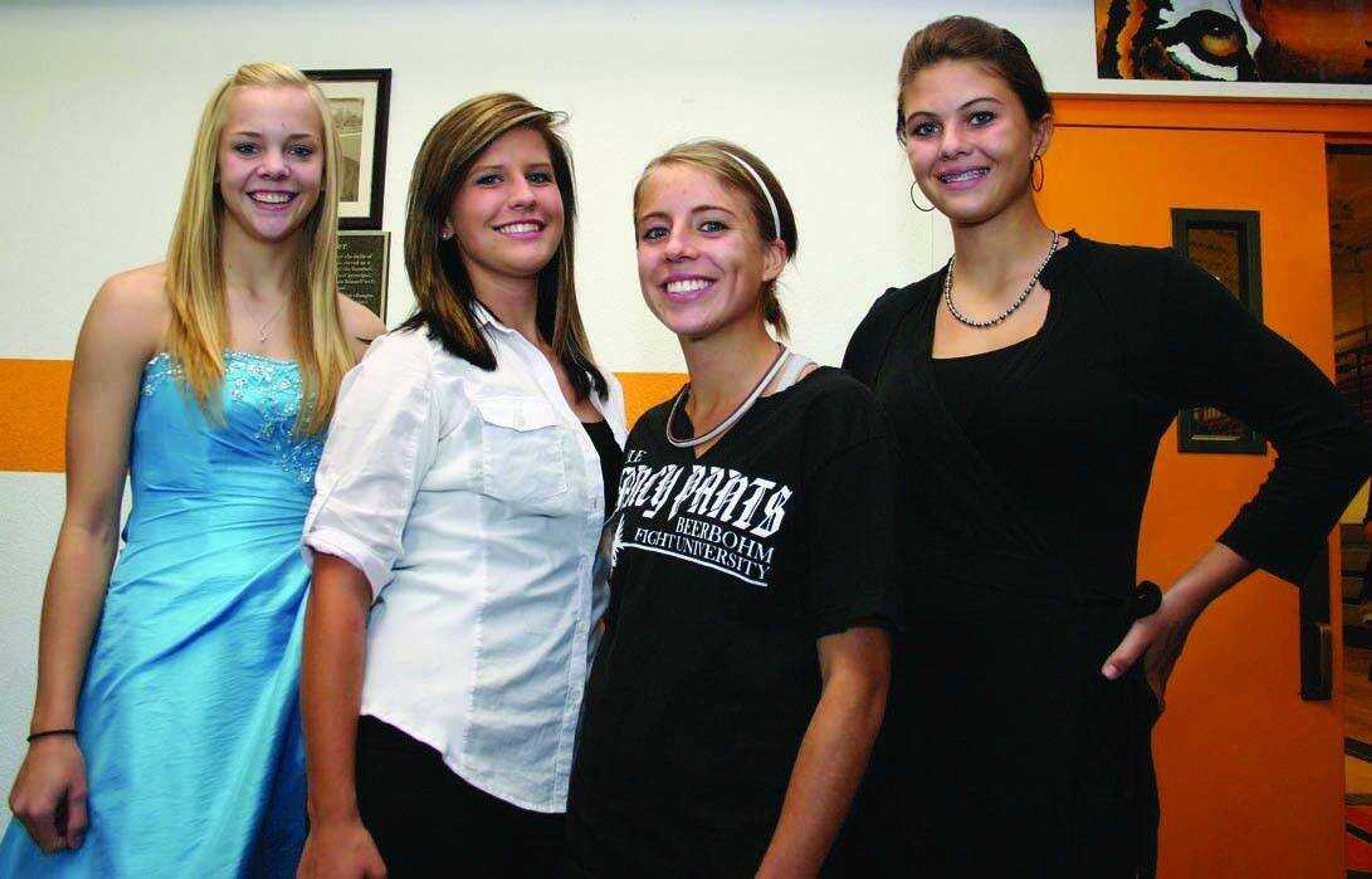 Vying for the title of Homecoming Queen are, from left, Jessica Liercke, Haley Schaefer, Jordan Vivier and Claudia Bermensolo. Not pictured is Alexis Rios. The queen will be crowned at halftime of Friday's game against Middleton. <i><small>Photo by Brian S. Orban</i></small>