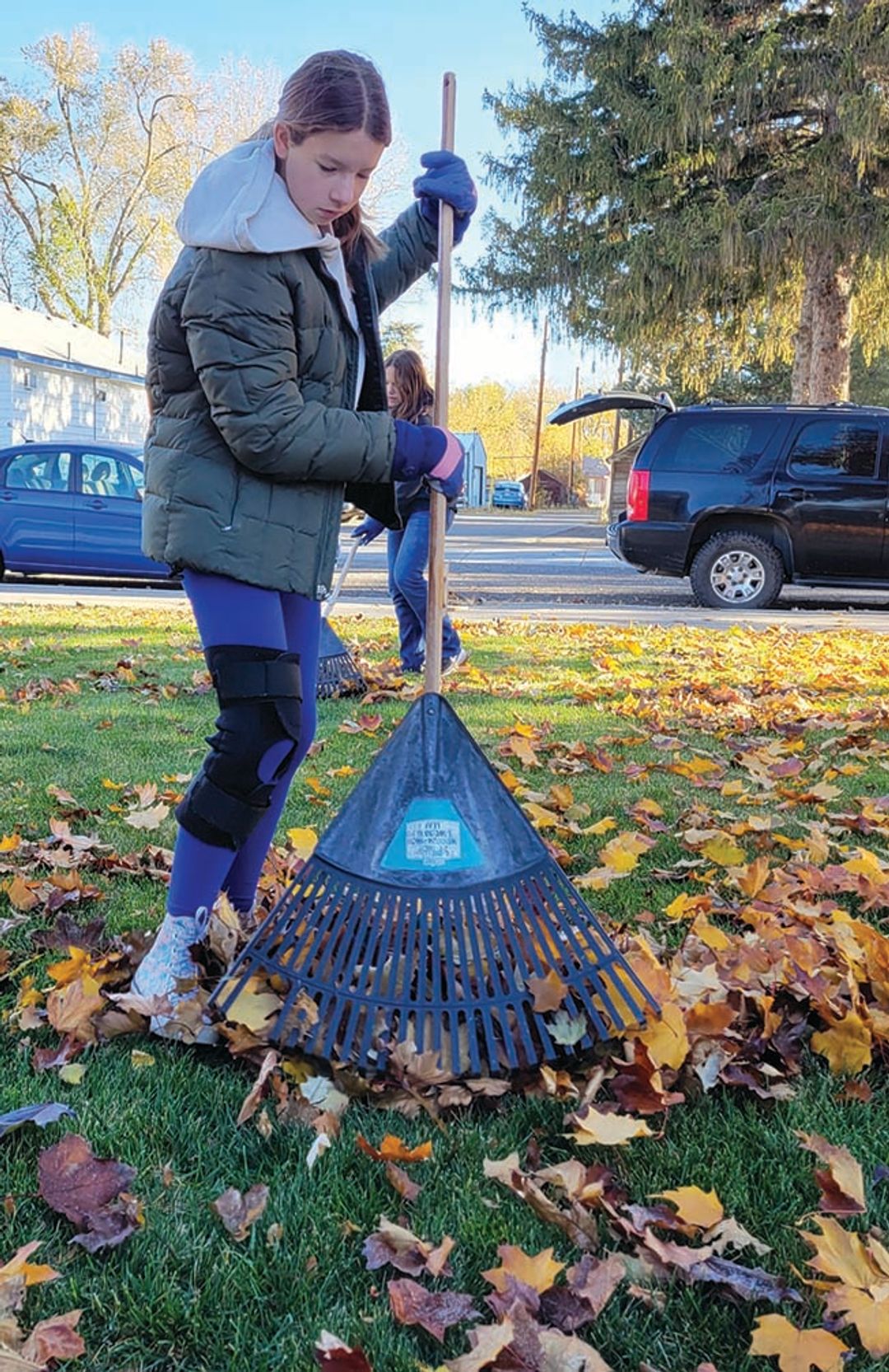 Fall Raking Volunteer Girl Scouts and Volunteers Join Forces to Help Neighbors Dur...