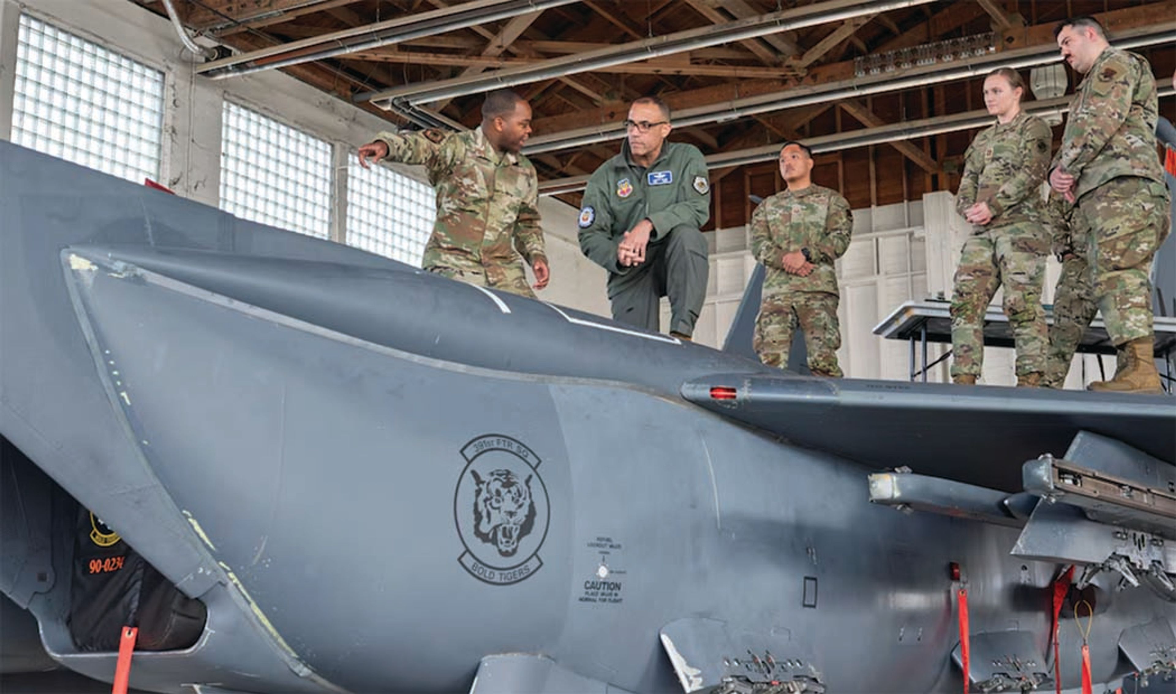 Senior Airman Garnett Drysdale, an avionics craftsman assigned to the 391st Fighter Generation Squadron at Mountain Home Air Force Base, provides a hands-on demonstration highlighting newly integrated capabilities of the base’s F-15E Strike Eagle to Gen. Adrian Spain, commander of Air Combat Command, during the general’s recent visit with the Gunfighters stationed here. 