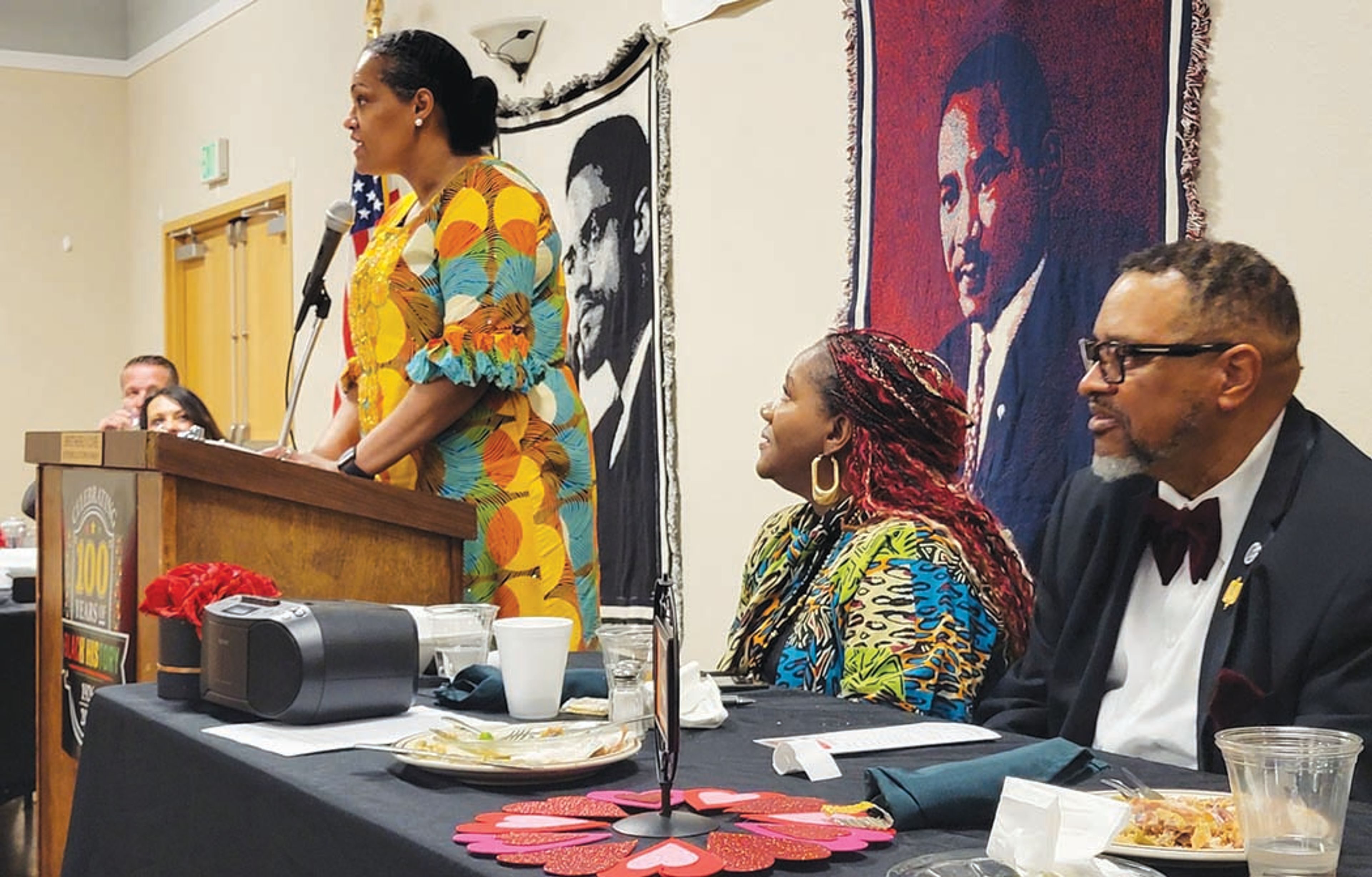 Members of the Mountain Home Black History Month committee listen as Col. Saunya Bright, commander of the 366th Medical Group at Mountain Home Air Force Base, speaks at this year’s Black History Month Banquet. Her speech highlighted the legacy of the Tuskegee Airmen, who overcame various types of racial discrimination to achieve distinguished recognition for their efforts to protect allied forces during World War II.