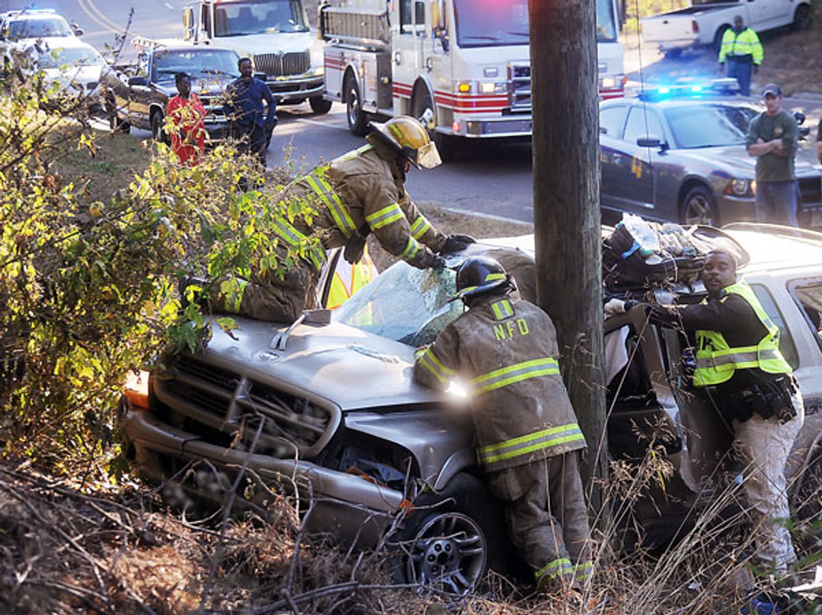 News photos: Wreck injures two on Martin Luther King Jr. Roa...