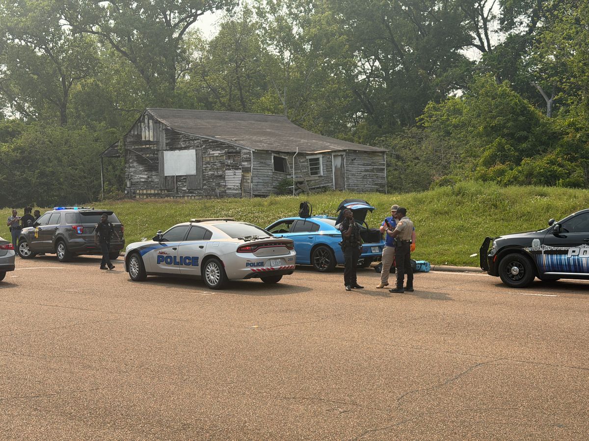 Two people in custody following shooting near Broadmoor Groc...