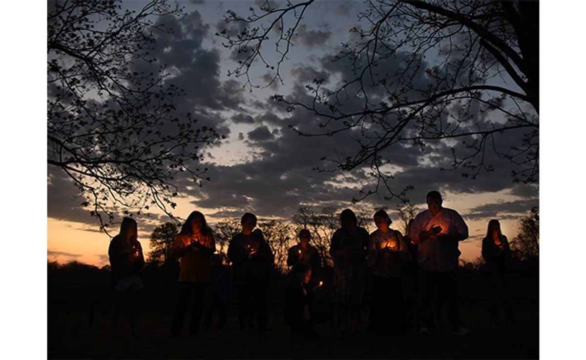 Vigil for slain man held Friday night on third anniversary o...