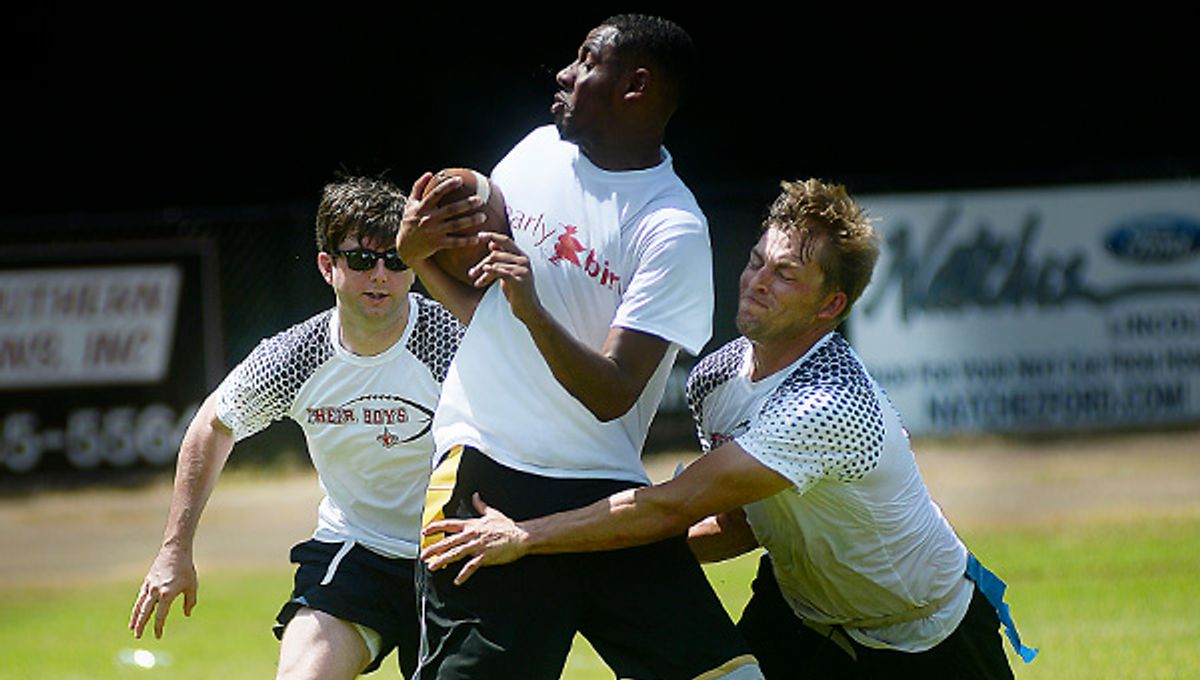 THE GLORY DAYS: Current, former football stars compete in 7-...
