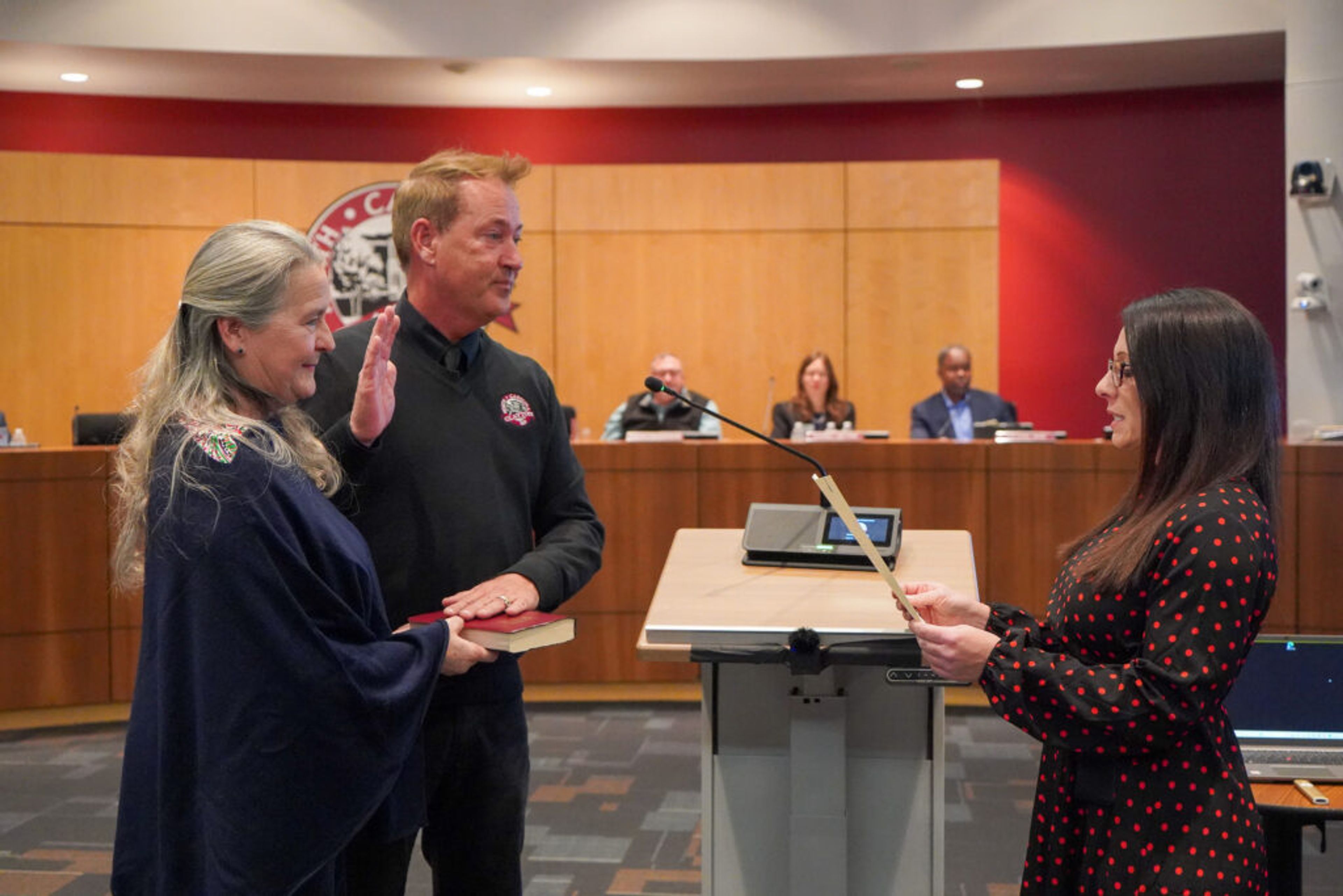 With his wife holding the Bible, Mayor Jody McLeod takes his oath of office. Town of Clayton photo