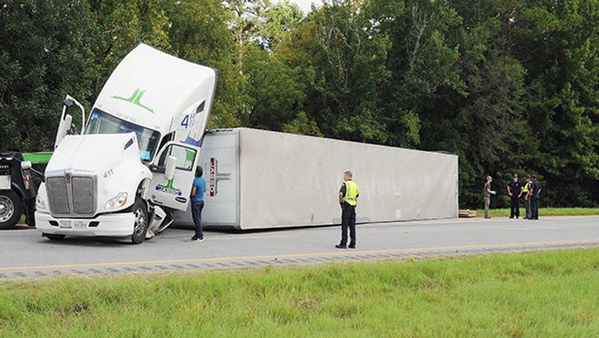 Early morning spill shuts down Interstate 65