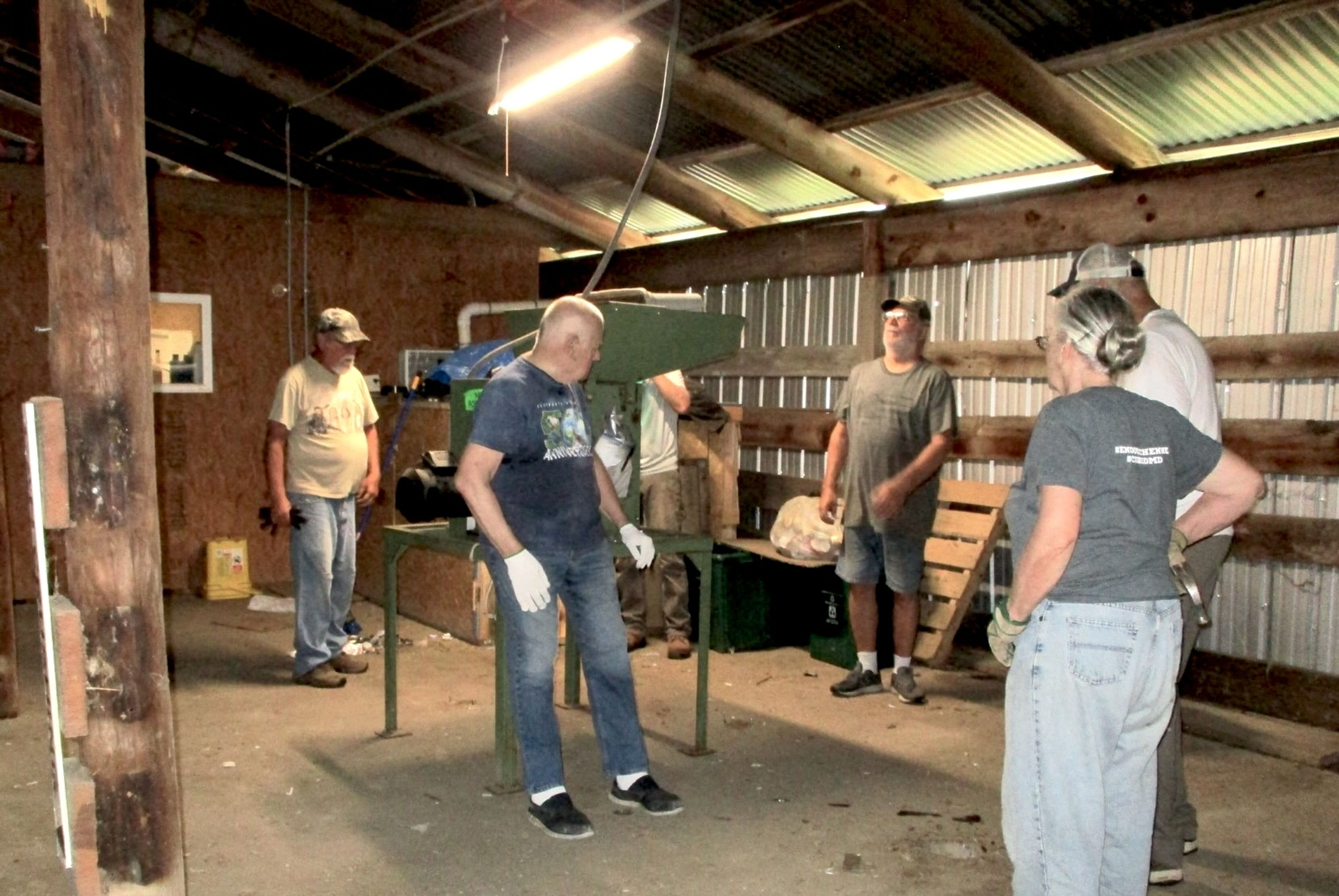 
The Bollinger County Recycling Center manager, Allen, directs a crew of volunteers on a recent work day at the center. Pictured (from left) are Frank Bridges, Roger Burr, Bill Teeters behind the can crusher, Allen, Mike Trehy and Lisa Santi.
