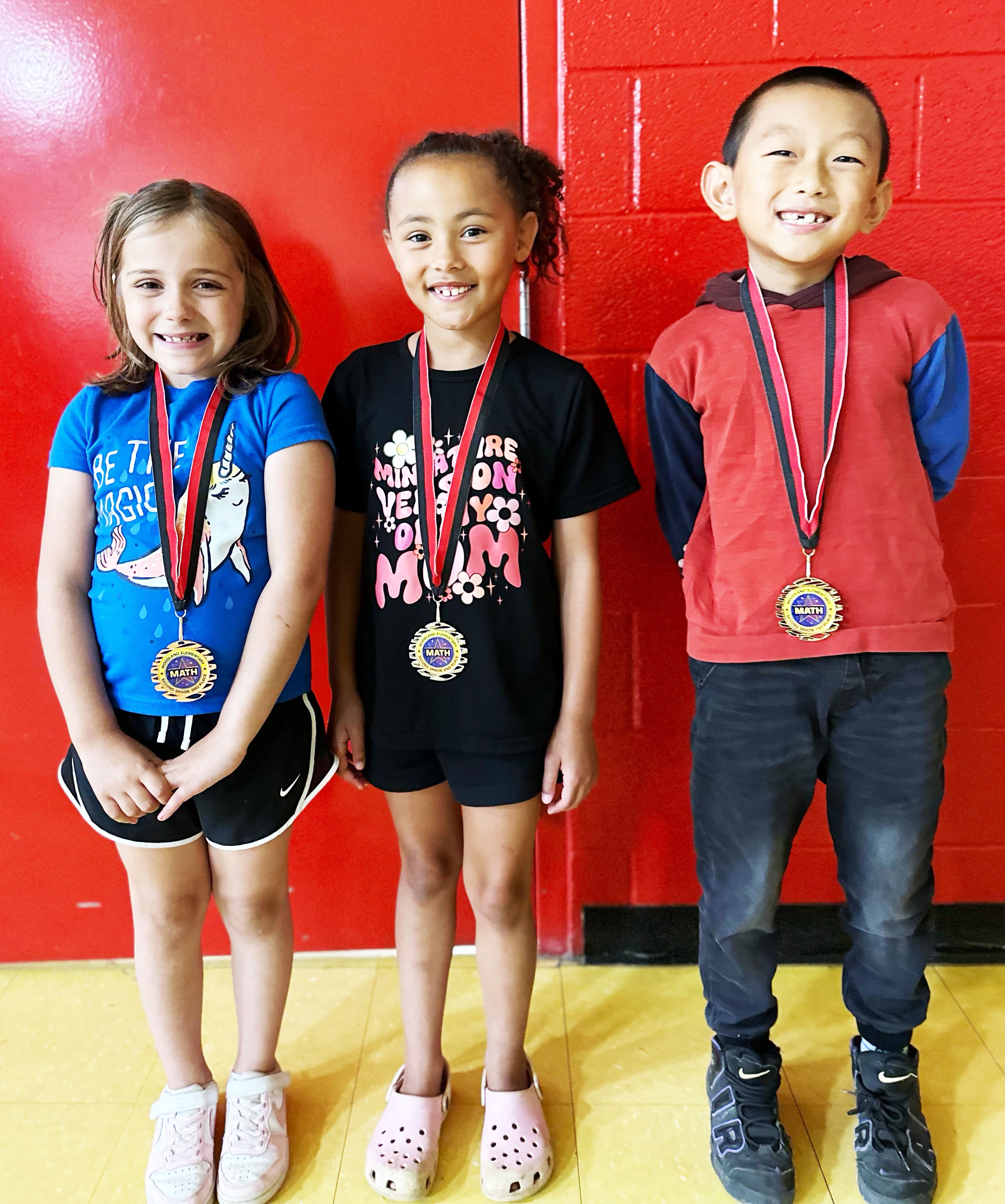 Second-grade winners (from left) include Kennedy Ritter, third place; Brynlee Killian, second place; and Lucas Li, first place