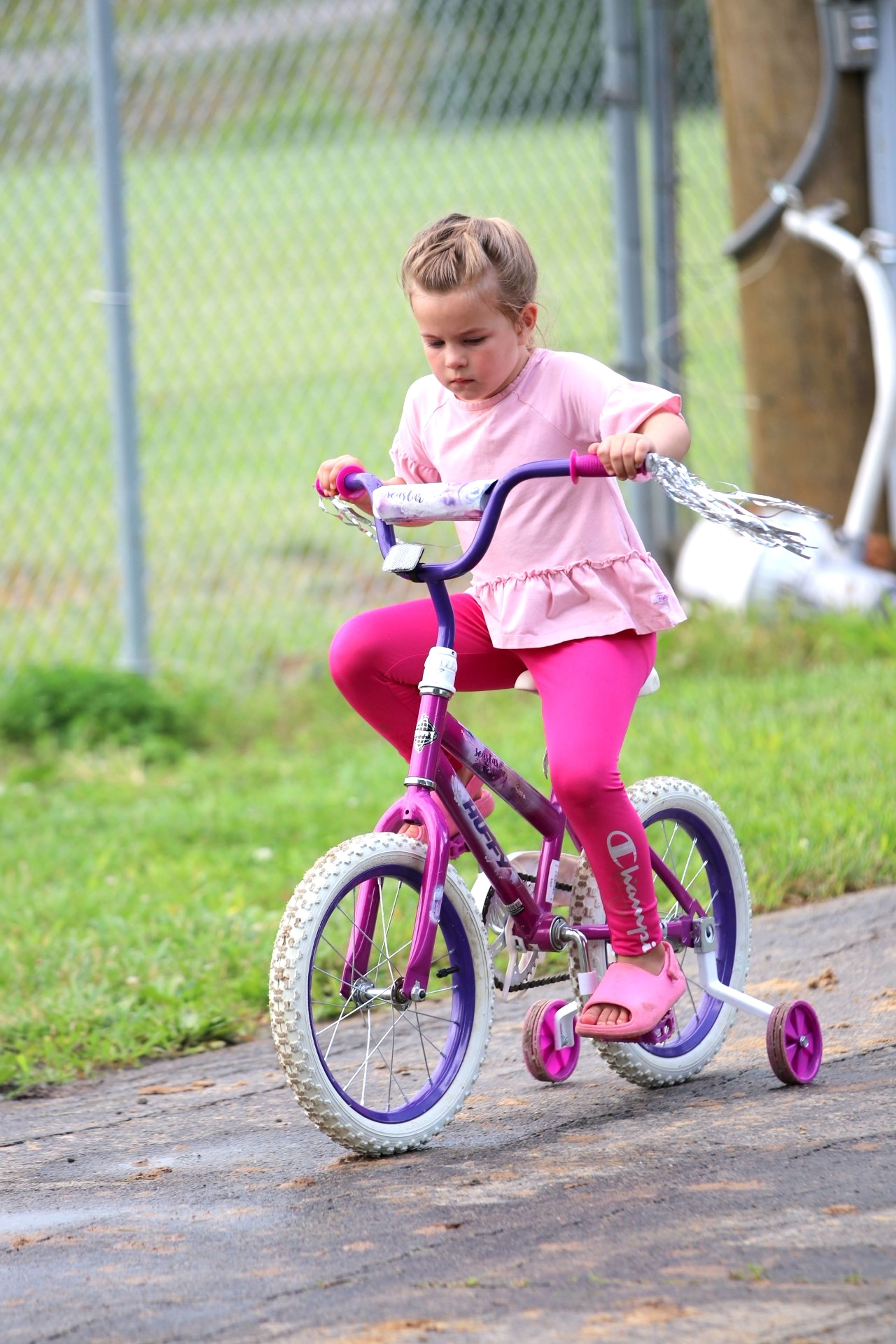 
Birdie Vandeven practices her biking skills on the track at the Leopold Sports Fest.