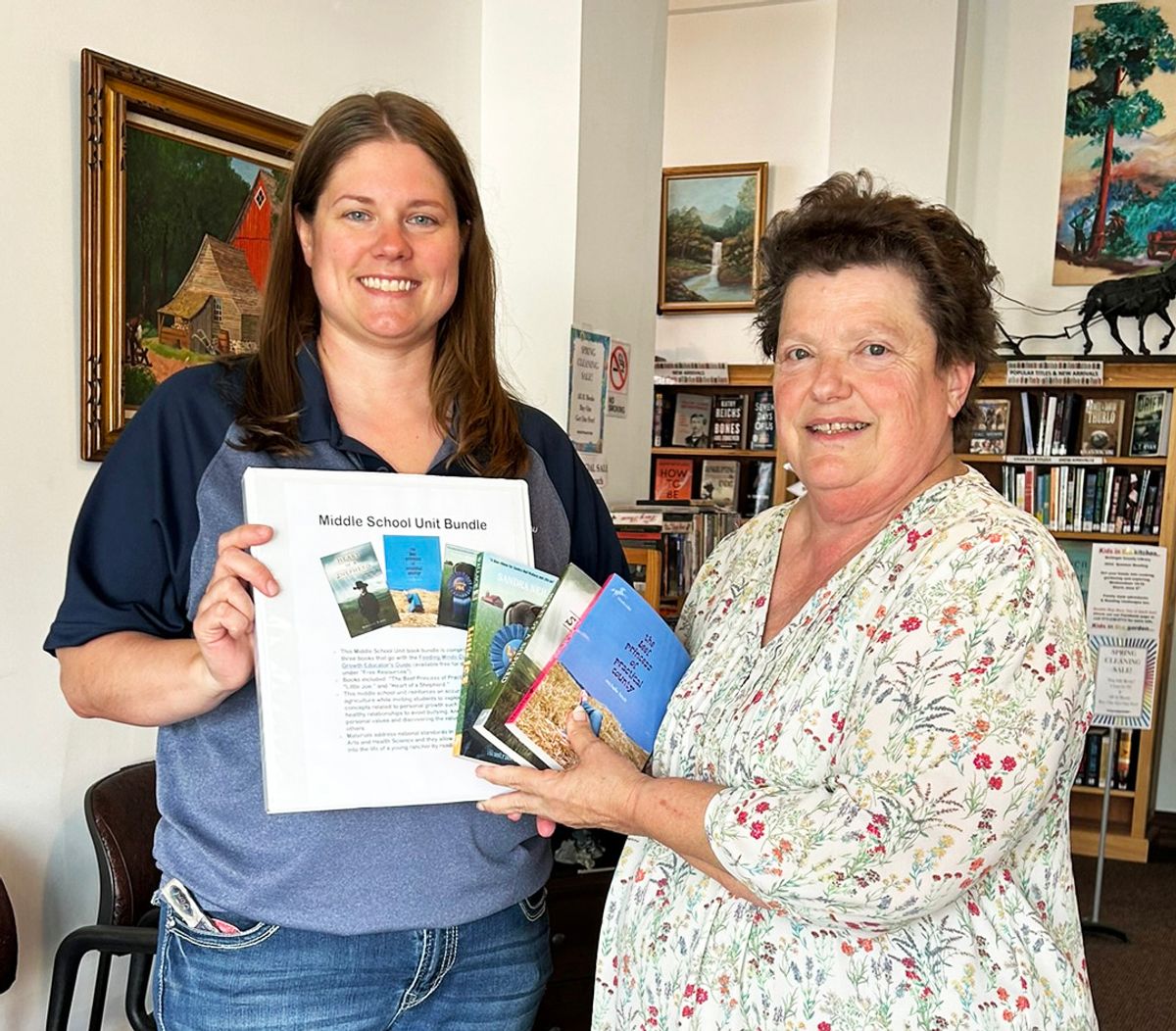 BoCo Farm Bureau board members donate books to library, schools