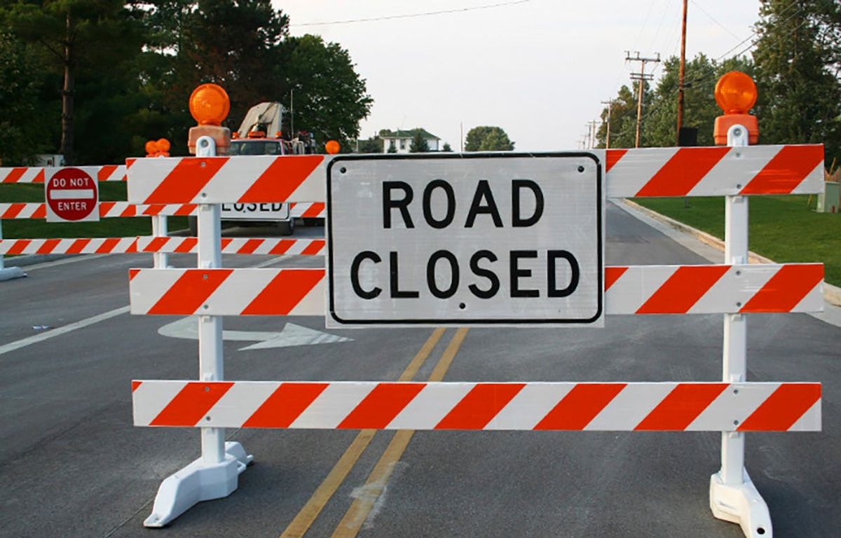 Emergency road closure on County Road 7718 after wooden brid...
