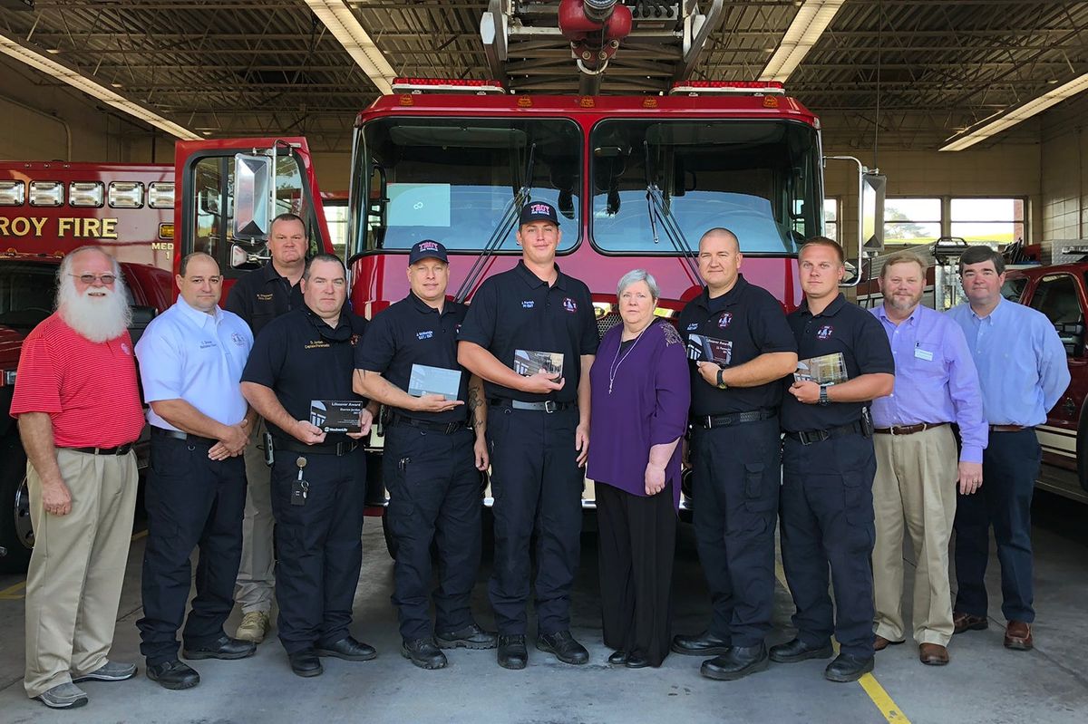 Firefighters honored for saving woman's life