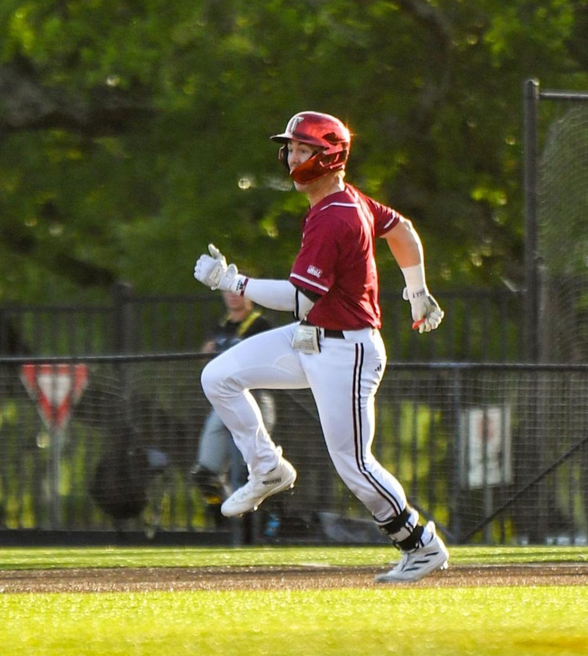 Shane Lewis breaks home run record as Trojans clinch series