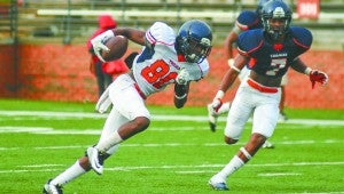 Under the lights Charles Henderson Trojans hold final scrimmage befor...
