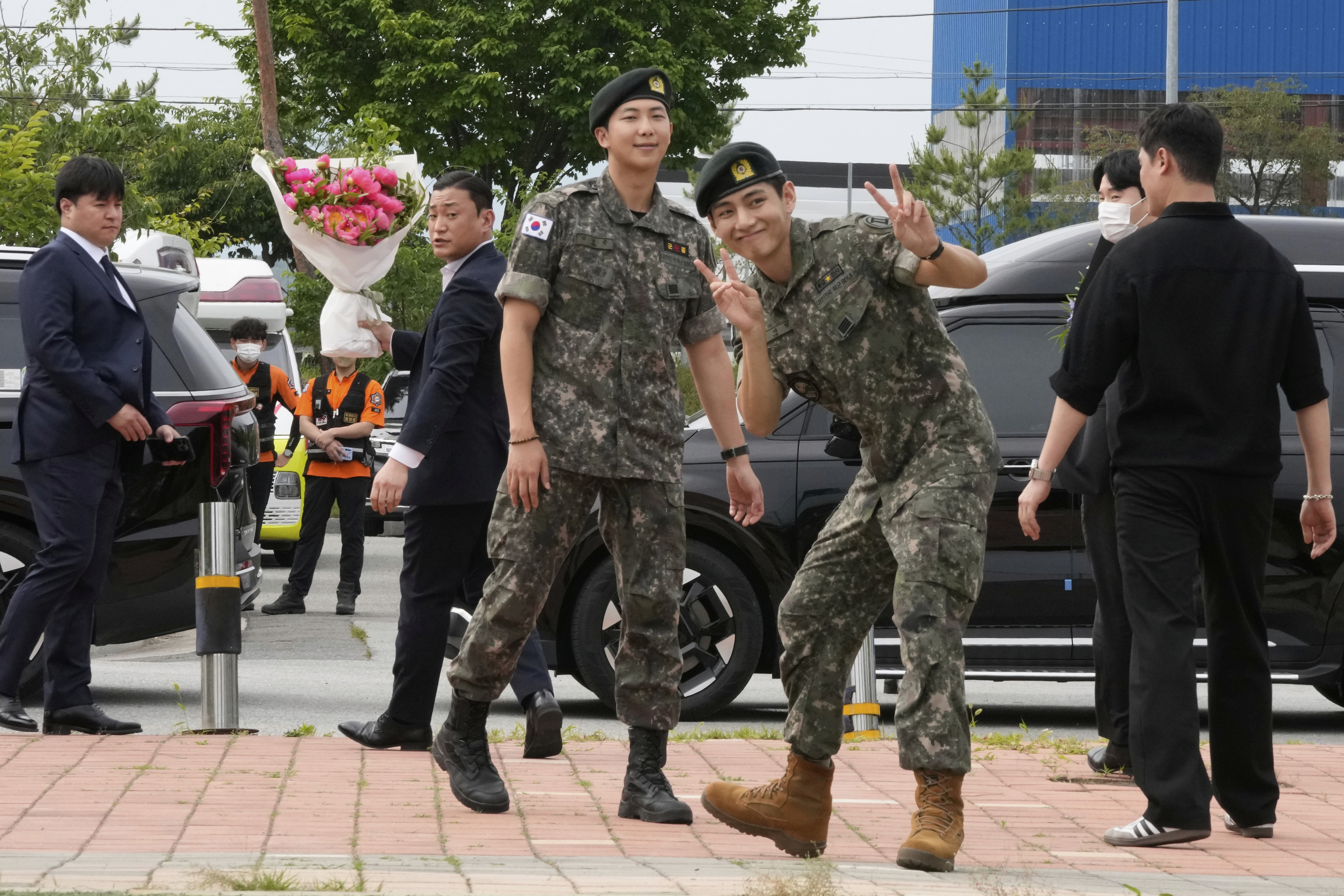 AP PHOTOS: BTS stars Jimin and Jung Kook discharged from mil