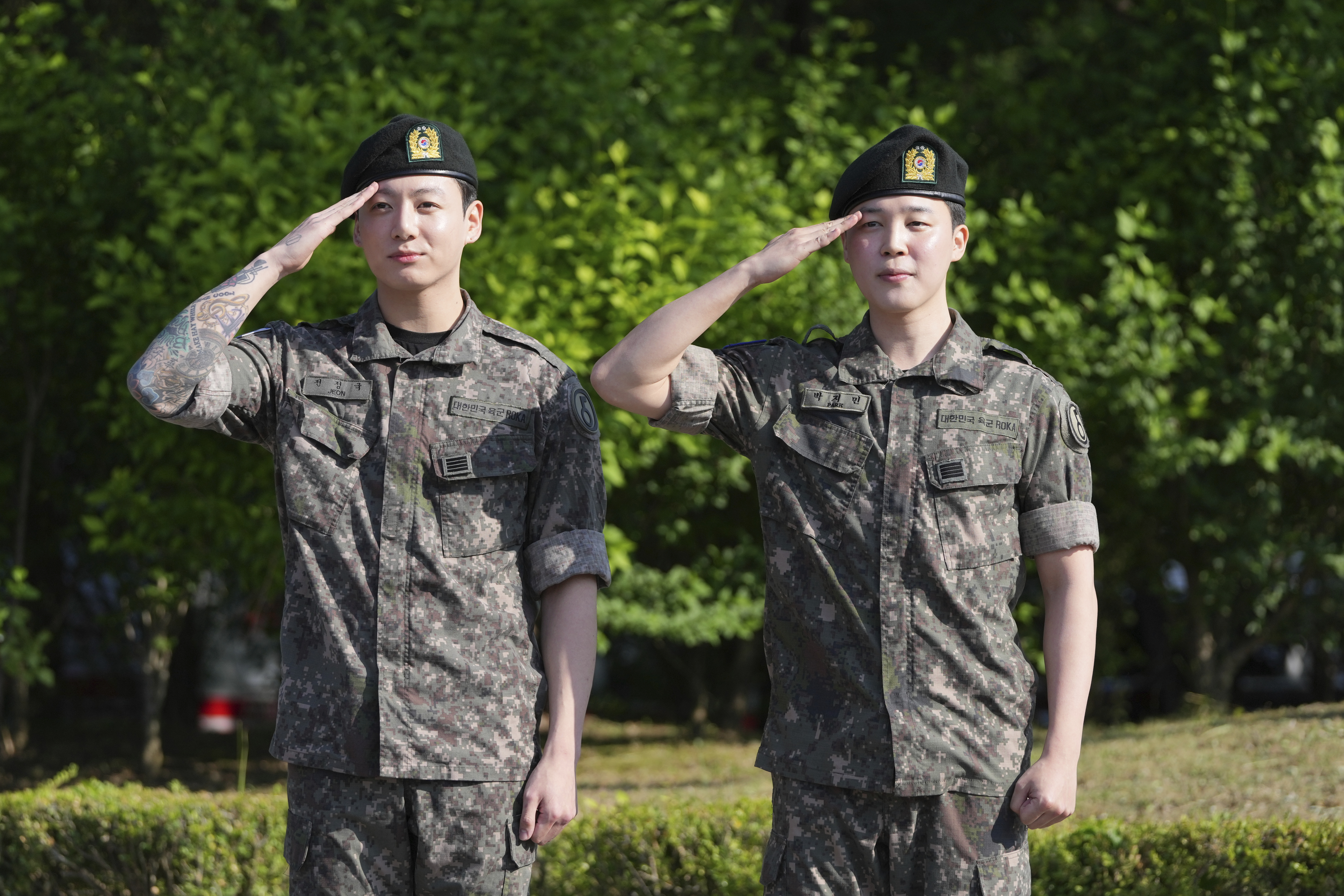 AP PHOTOS: BTS stars Jimin and Jung Kook discharged from mil