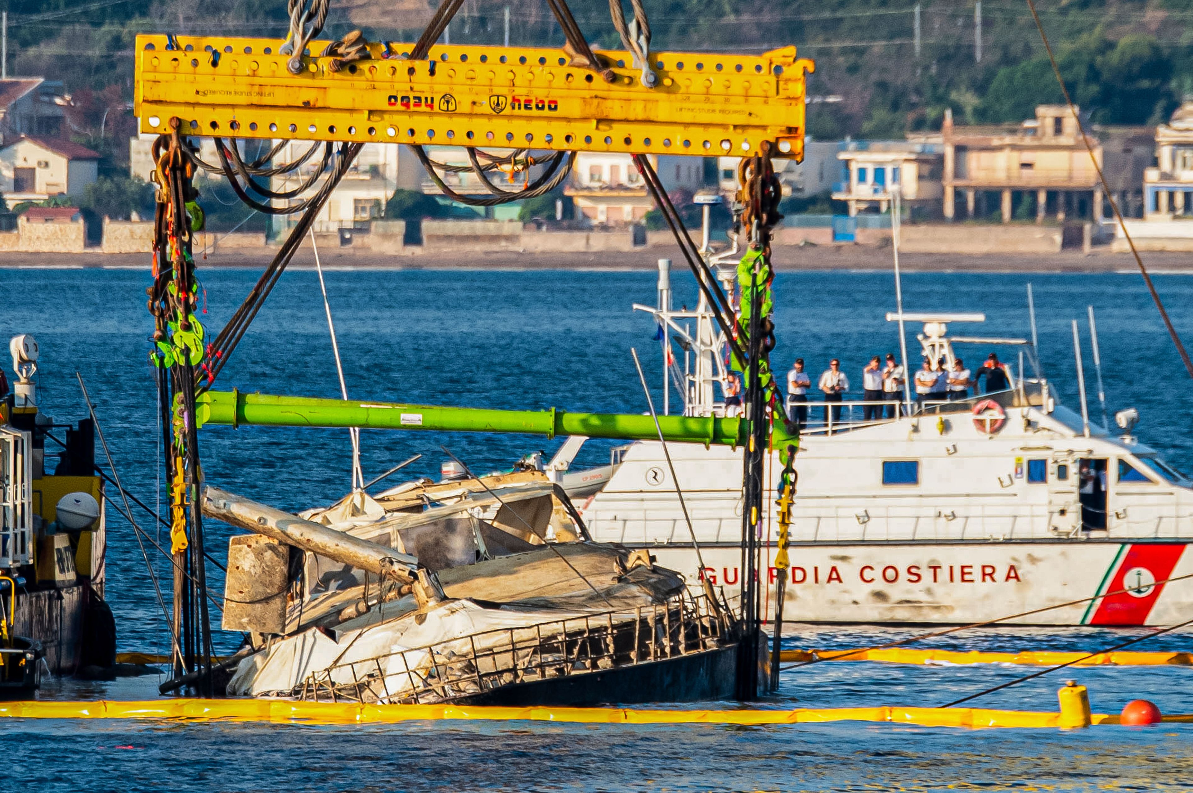 Sunken Bayesian superyacht lifted out of the water off Sicil