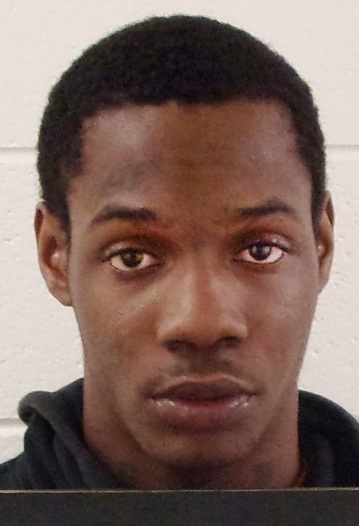 Murder suspect surrenders