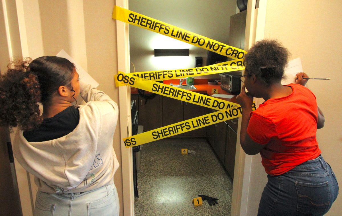 Camp exposes kids to investigative work