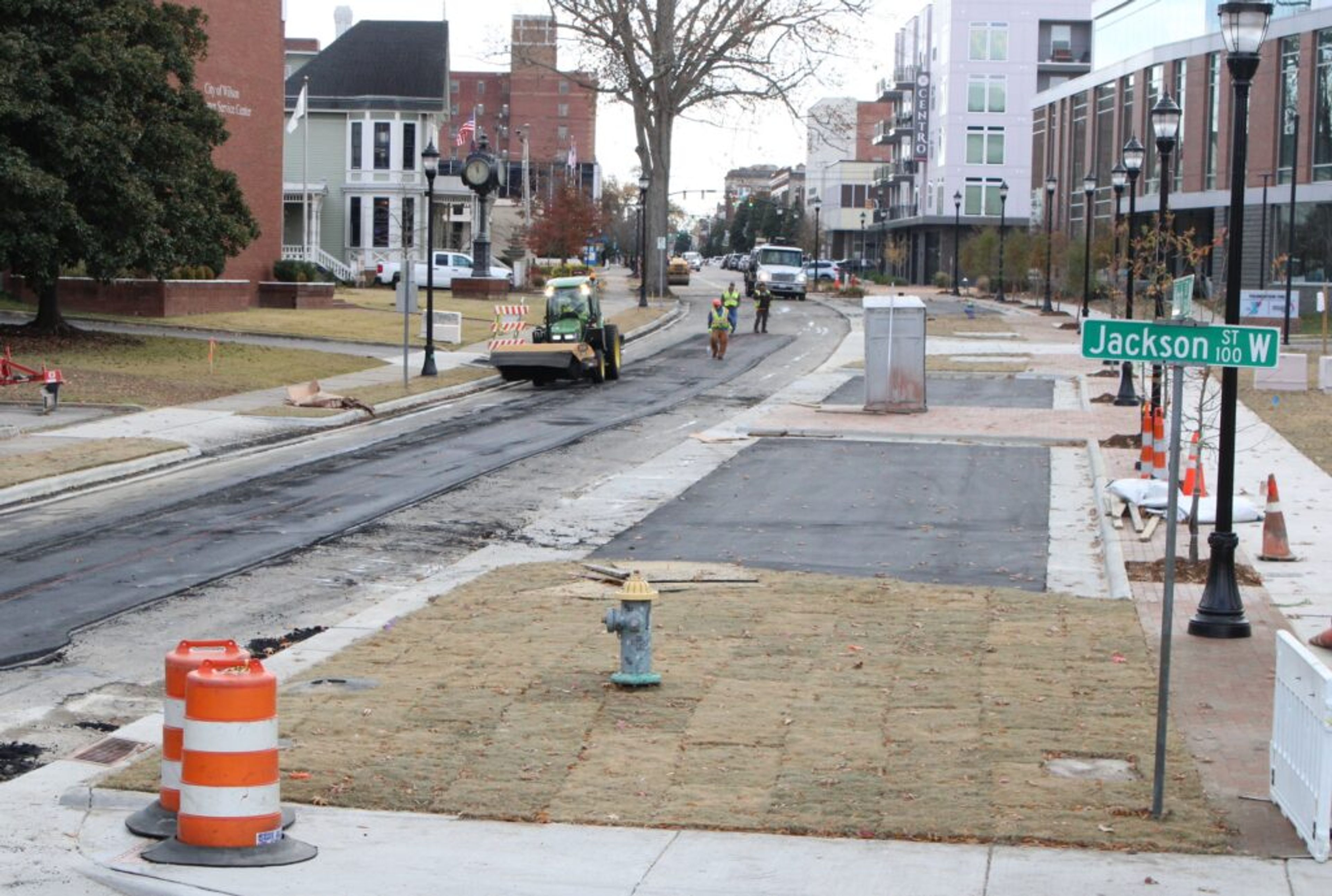 S.T. Wooten Co. workers pave Nash Street between Jackson and Pine streets on Thursday just in time for Saturday's Wilson Christmas Parade. The parade starts at 11 a.m. and runs along Nash Street.