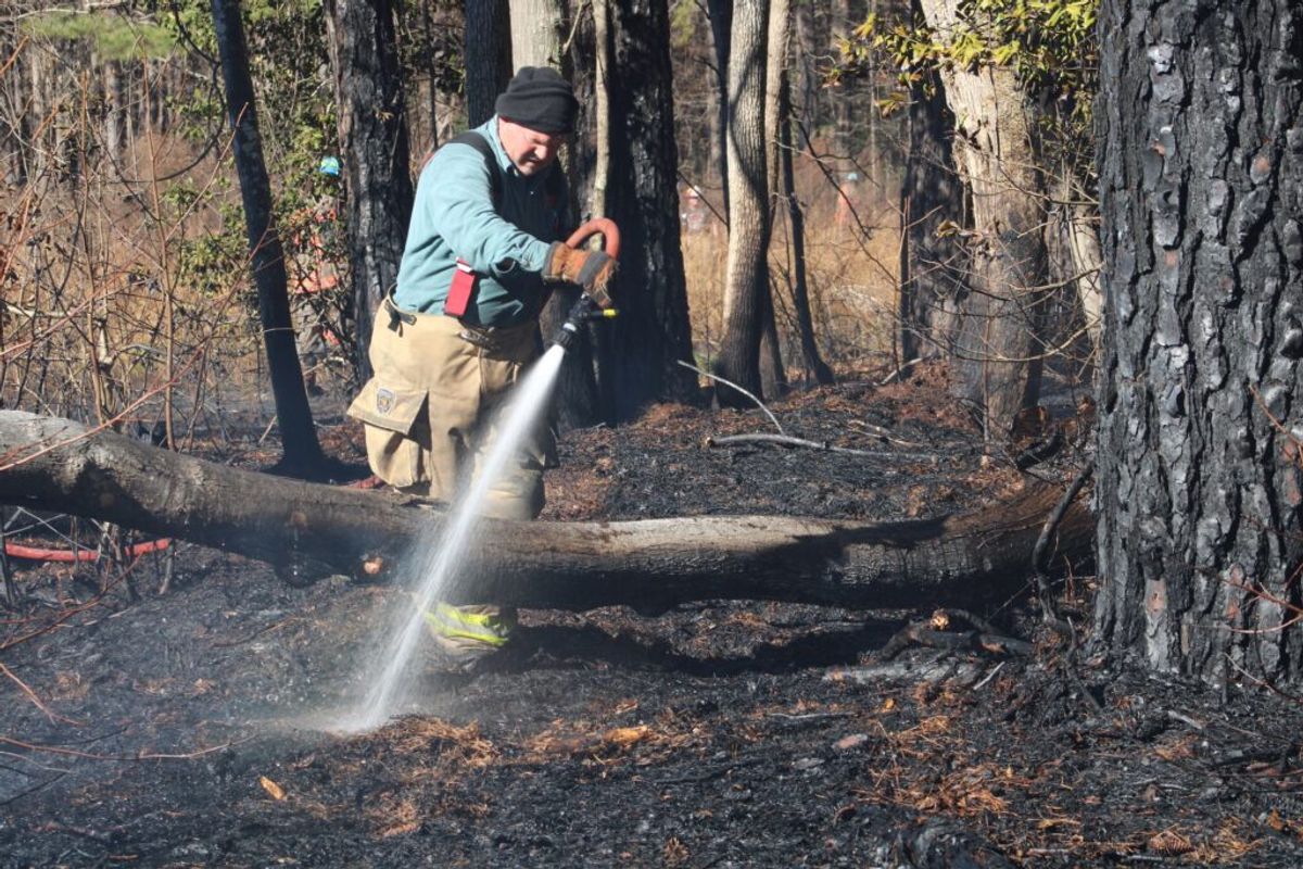 Brush fire burns 2 acres on Packhouse Road