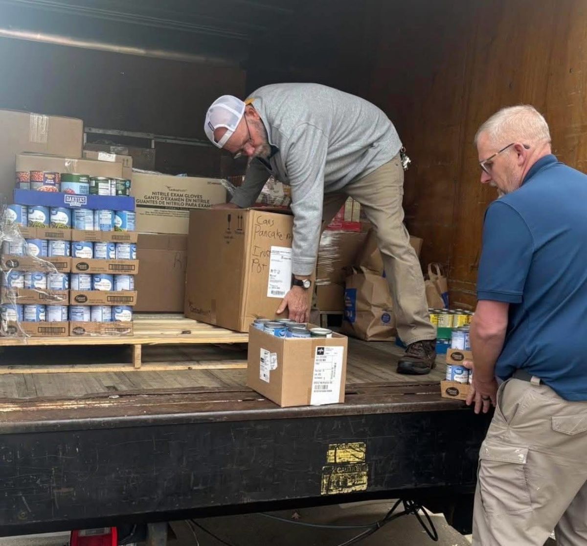 Hospital employees collect food for Wesley Shelter
