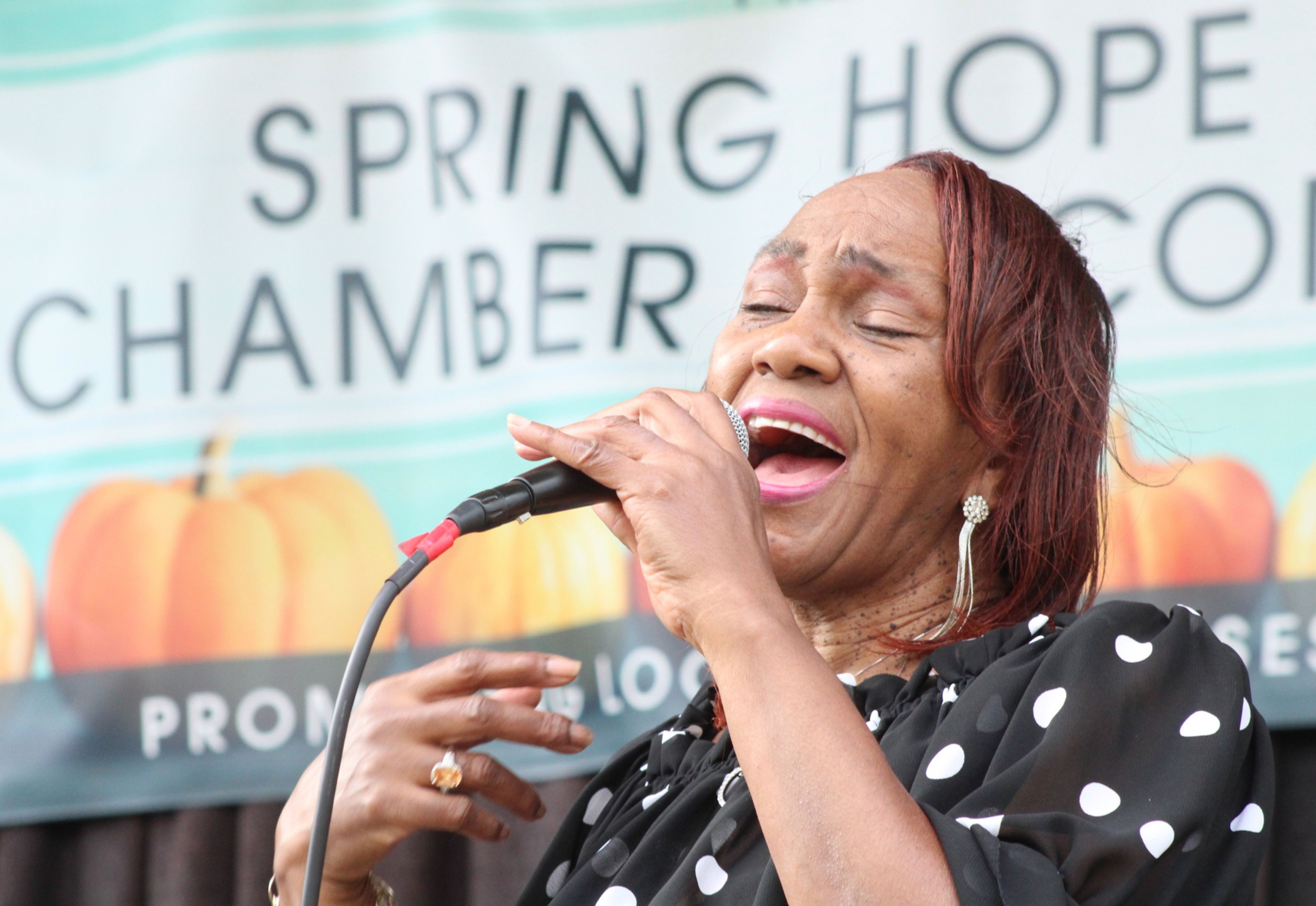 Mollie Hunter sings with The Monitors on Saturday in Spring Hope.  Drew C. Wilson | Times
