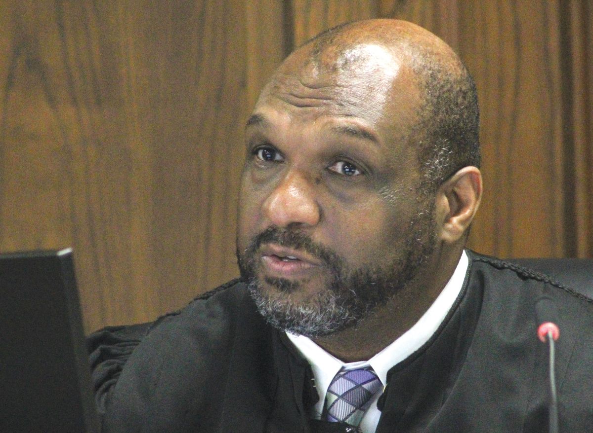 Bond reduced for man accused of killing wife