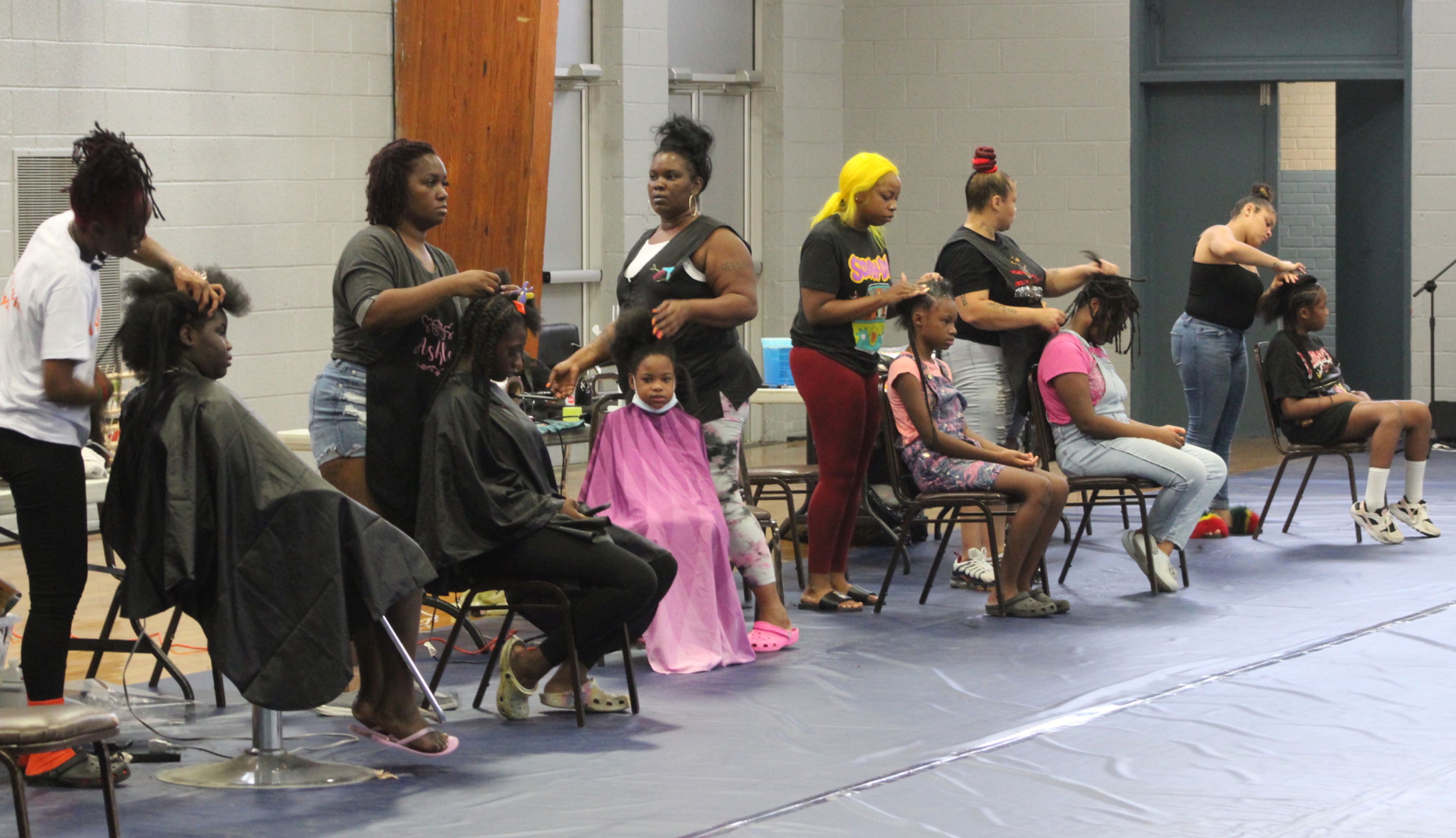 Free haircuts prepare students to start school