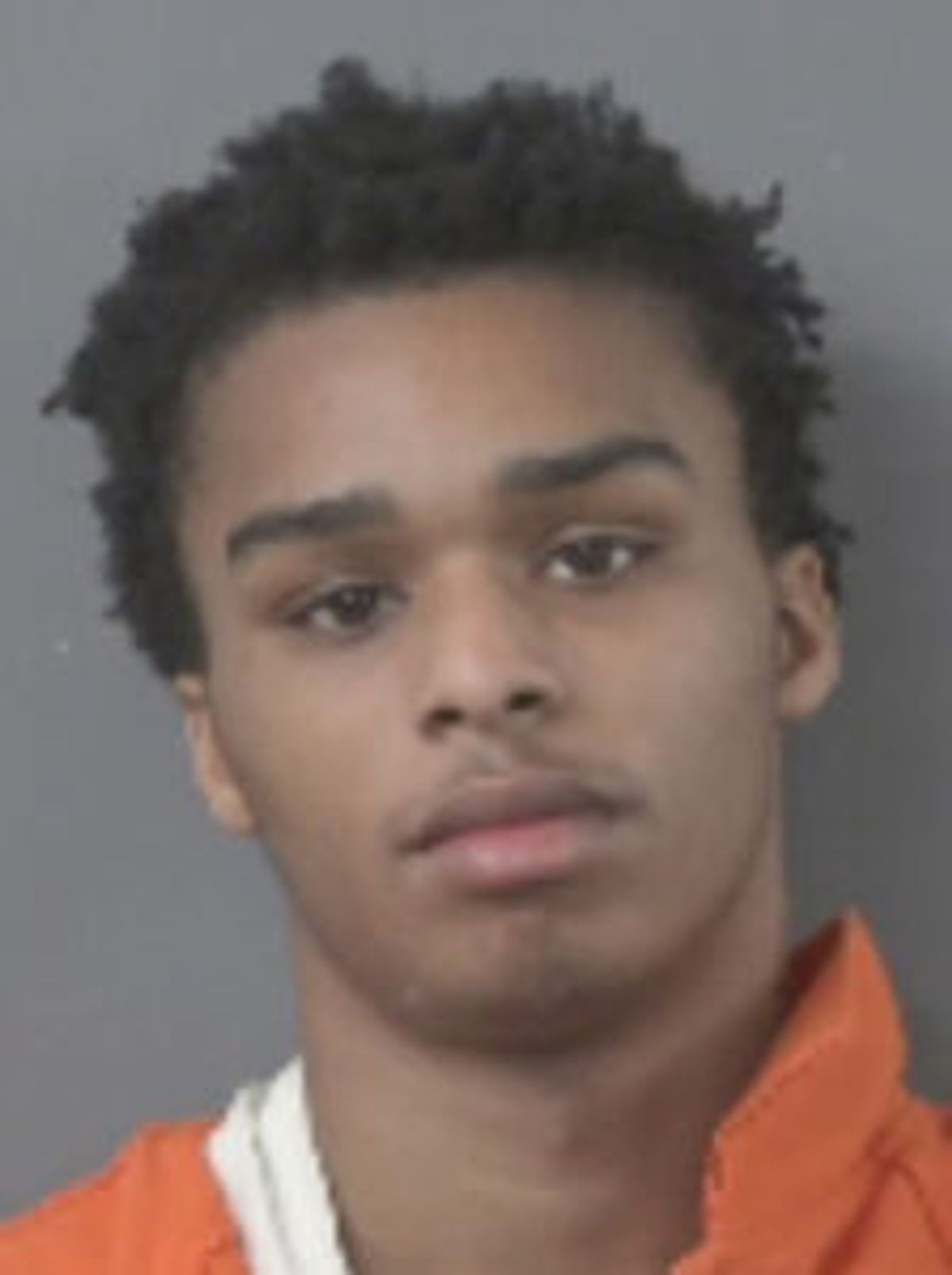 Second man charged in shooting at residence
