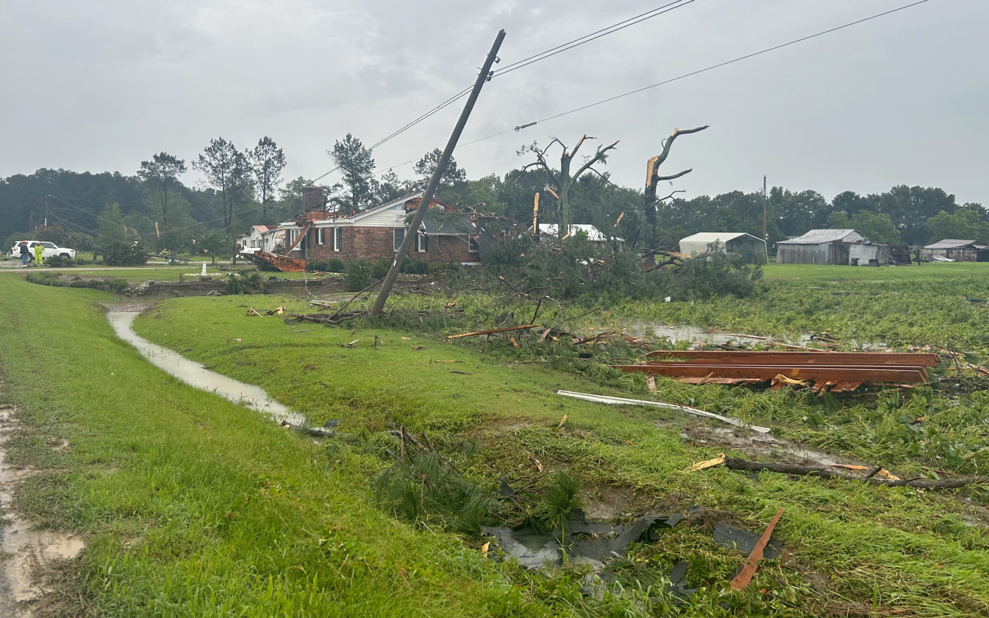 An early Thursday tornado snapped power lines and damaged homes on Lloyd Road near Lucama. Christopher Long | Times