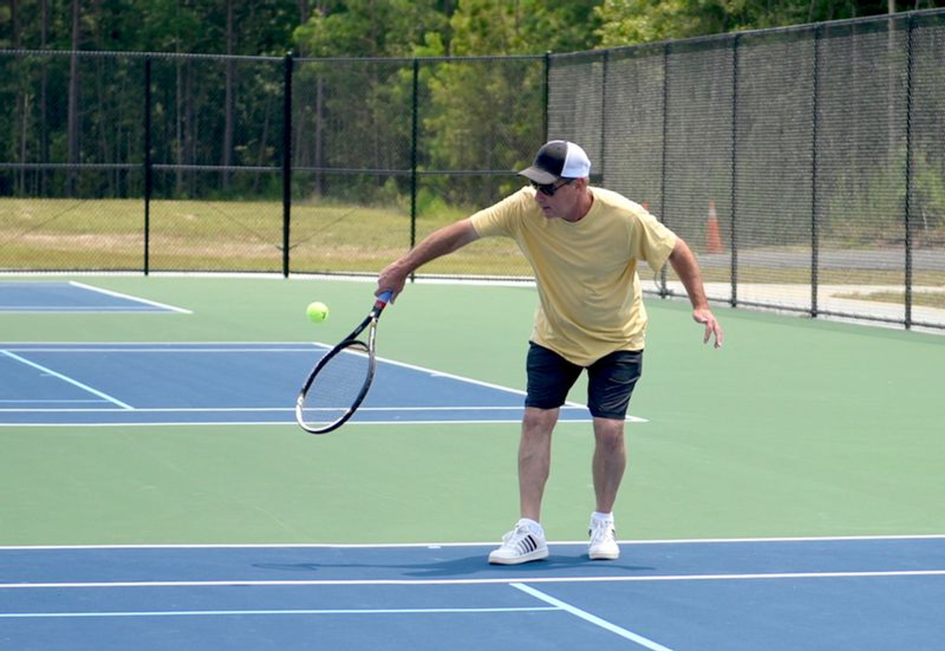 The Oxford Tennis Association took advantage of the grand opening to play a little tennis on the new courts. There are six courts at Granville Athletic Park. Amanda Dixon | Butner-Creedmoor News