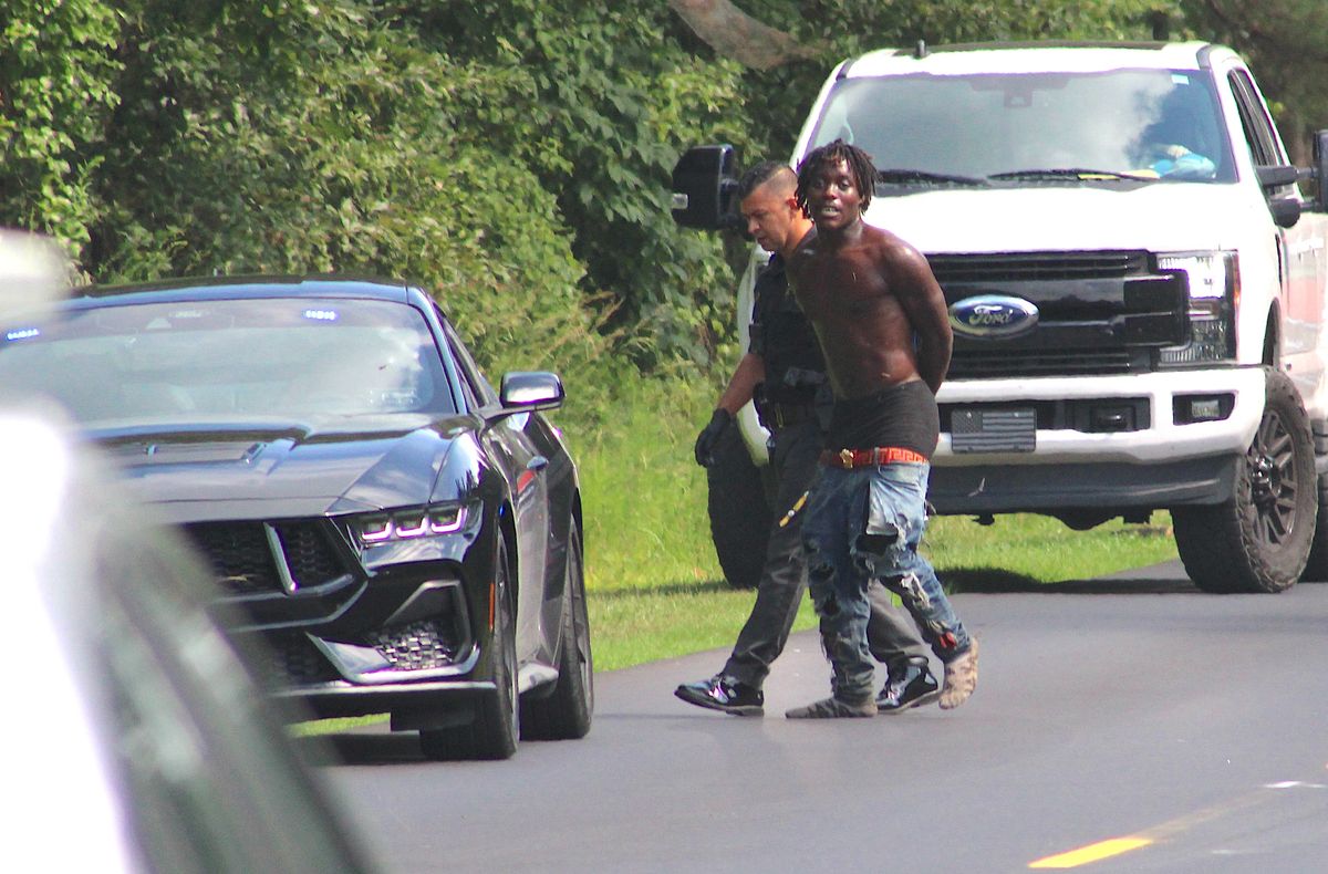1 arrested, 1 sought in dirt bike chase