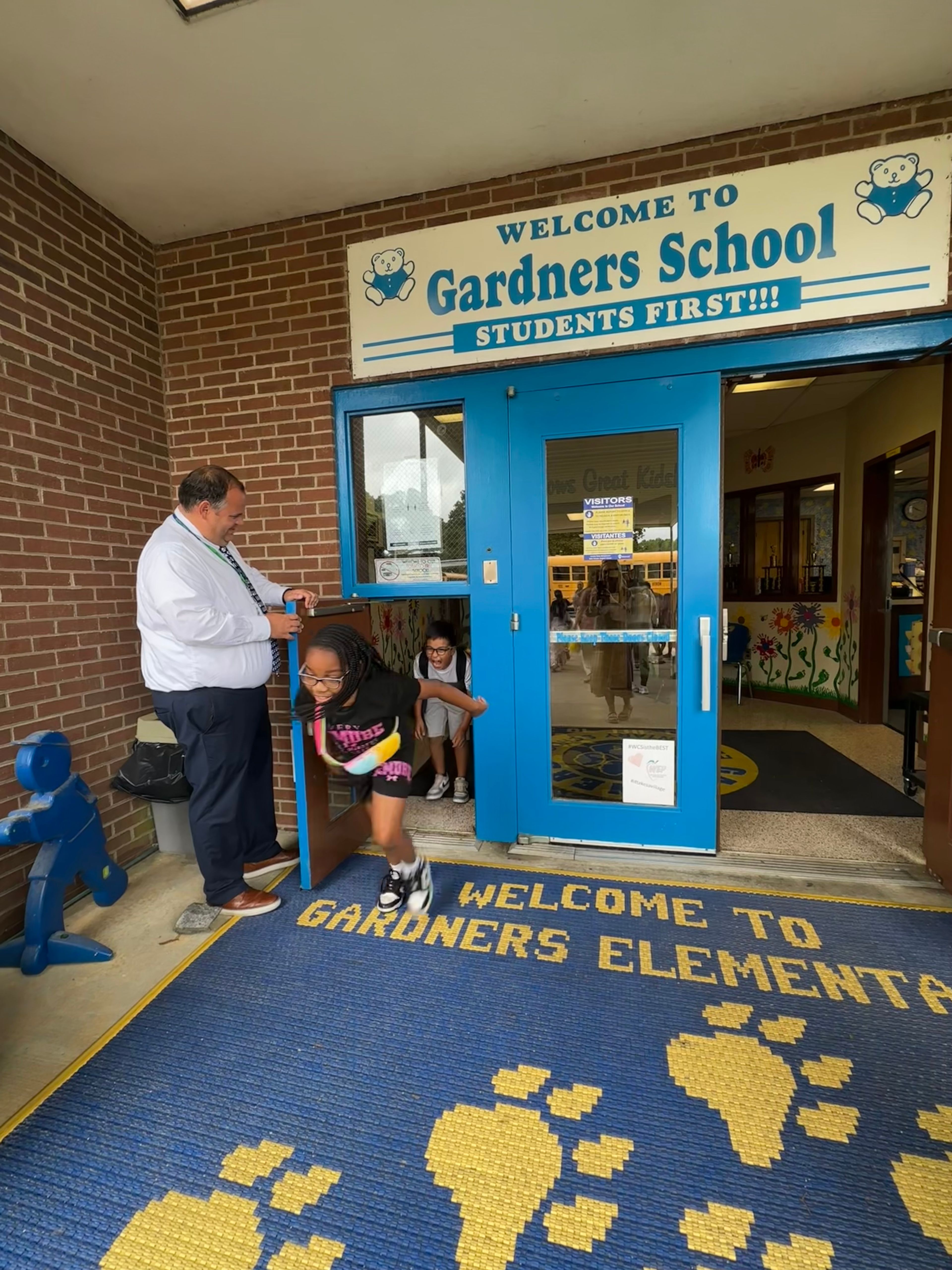Gardners students walk into summer