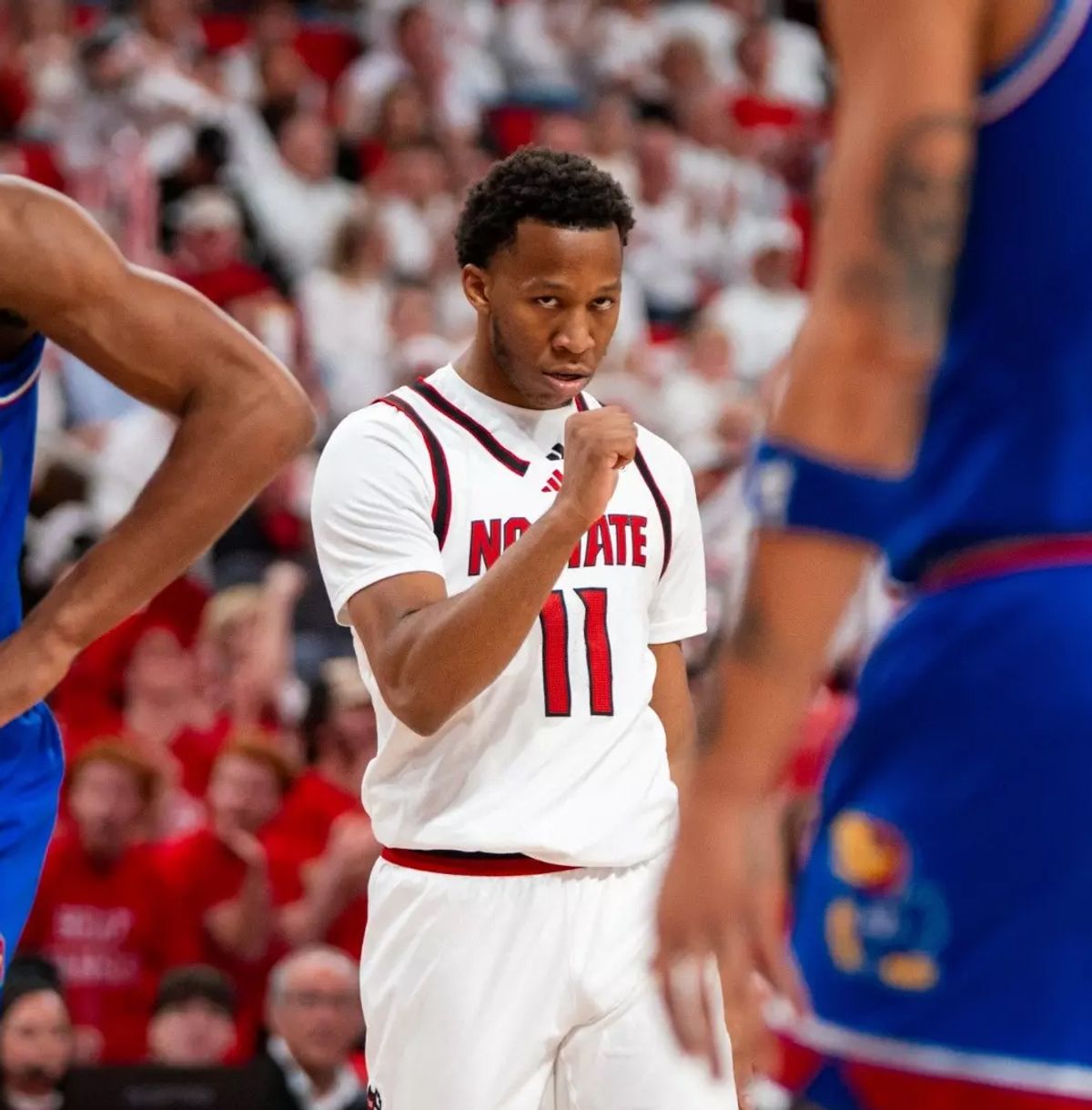N.C. State pushes No. 19 Kansas to OT but still searching for that signature win