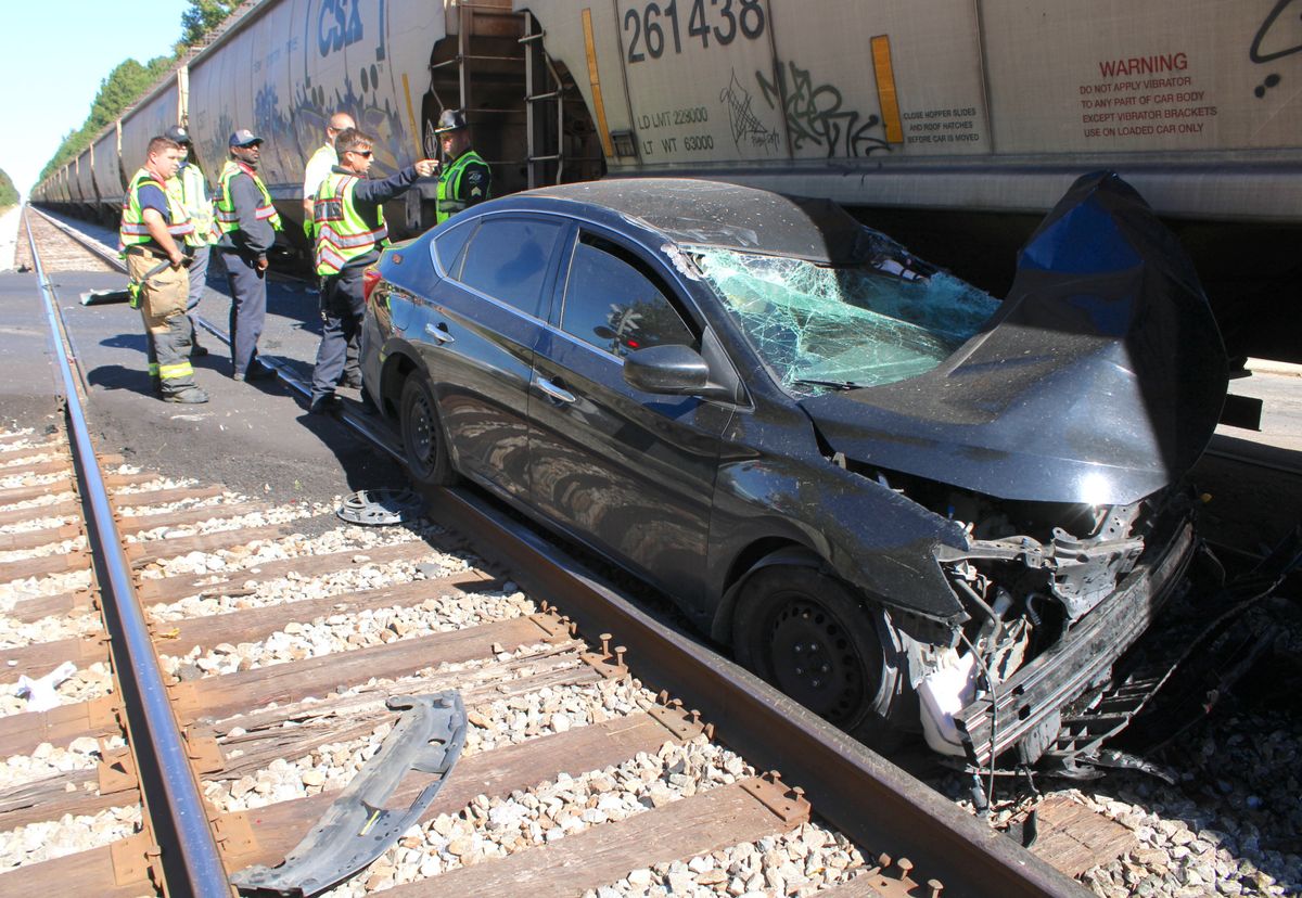 Driver cited in crash with train