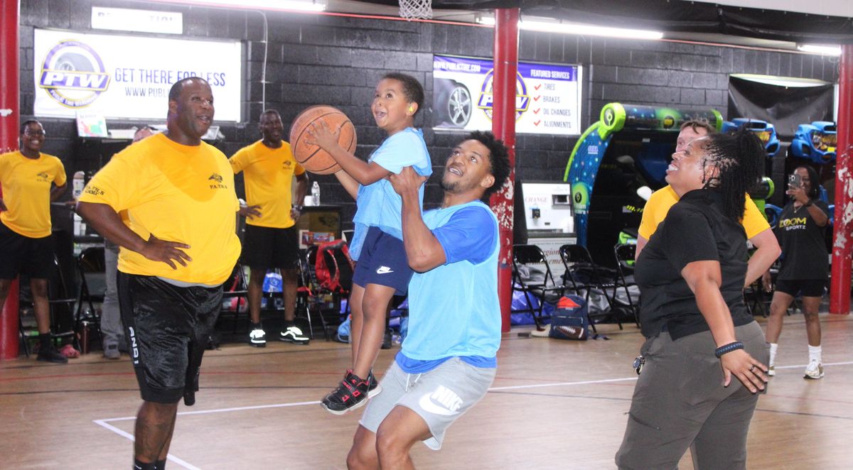Kids take on deputies at basketball camp