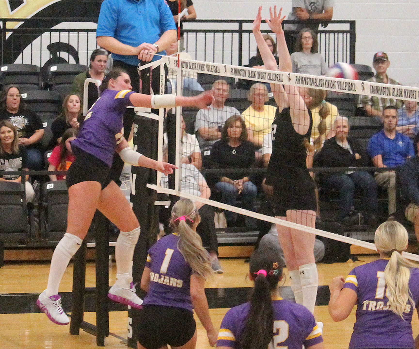 Lady Trojans move to 21-0 after intense 5-setter with Farmington
