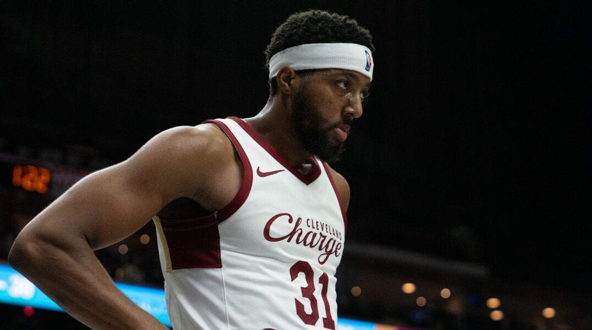 Thompson alum Chaney Johnson scores first NBA baskets in Net...