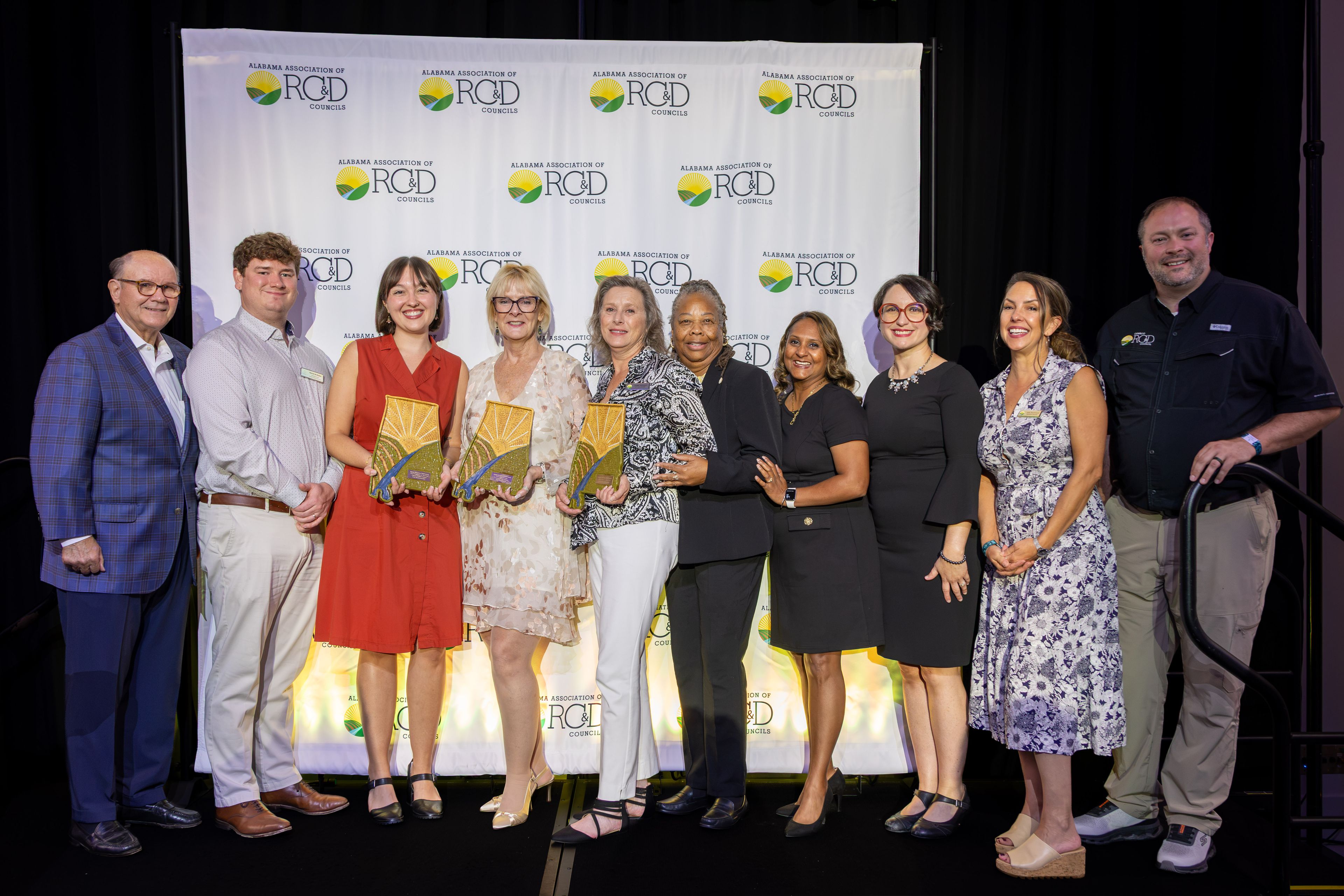 The Cosby Company founder Noopie Cosby, left, Cawaco RC&D Cool Green Trees program arborist Patrick McMahon,Cawaco RC&D communications specialist Erin Hackenmueller, Cawaco RC&D programs director Patti Pennington, Cawaco RC&D executive director Kellie Johnston, Cawaco RC&D Board Chairman Sheila Baker, Cawaco RC&D Cool Green Trees program director Grace Dugger, Cawaco RC&D Cool Green Trees program volunteer manager Sarah Jannot, Cawaco RC&D operations specialist Jody Drummond and Cawaco RC&D board member Chase Moore at Alabama Association of Resource Conservation & Development Councils annual conference.