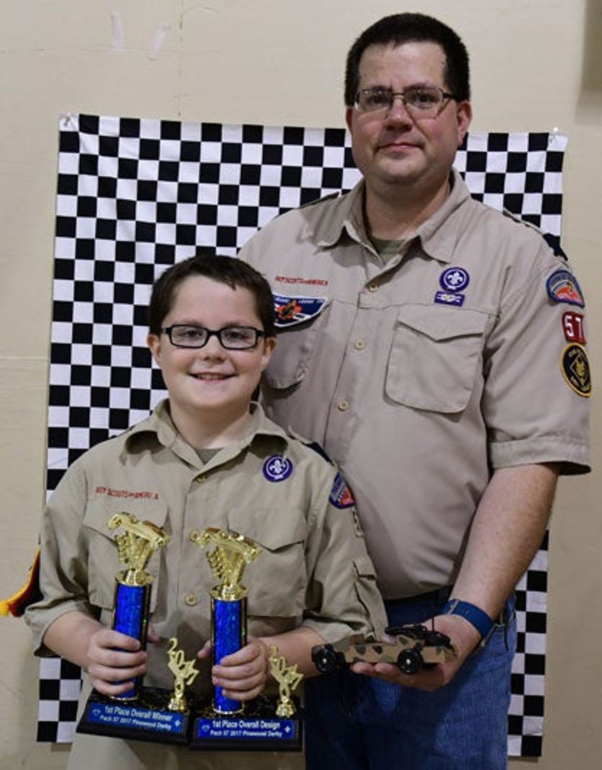 Cub Scout Racer Cub Scouts race in Pinewood Derby