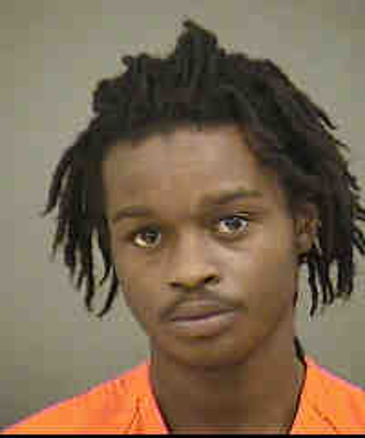 Charlotte homicide suspect turns himself in