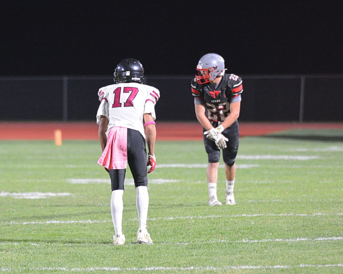 Perry forces 4 turnovers in commanding win over IAF