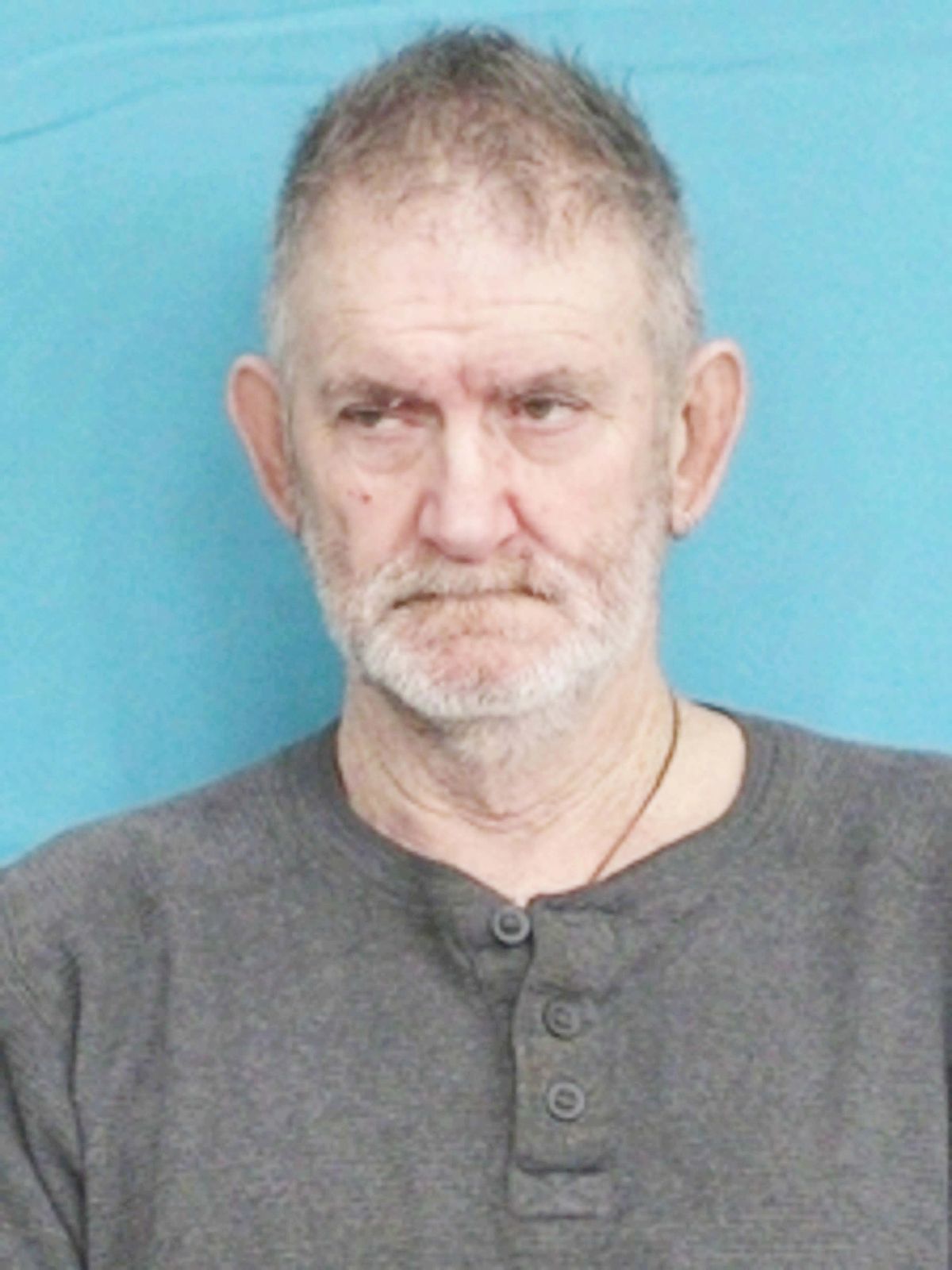 Jackson man arrested after human remains found near burn pit