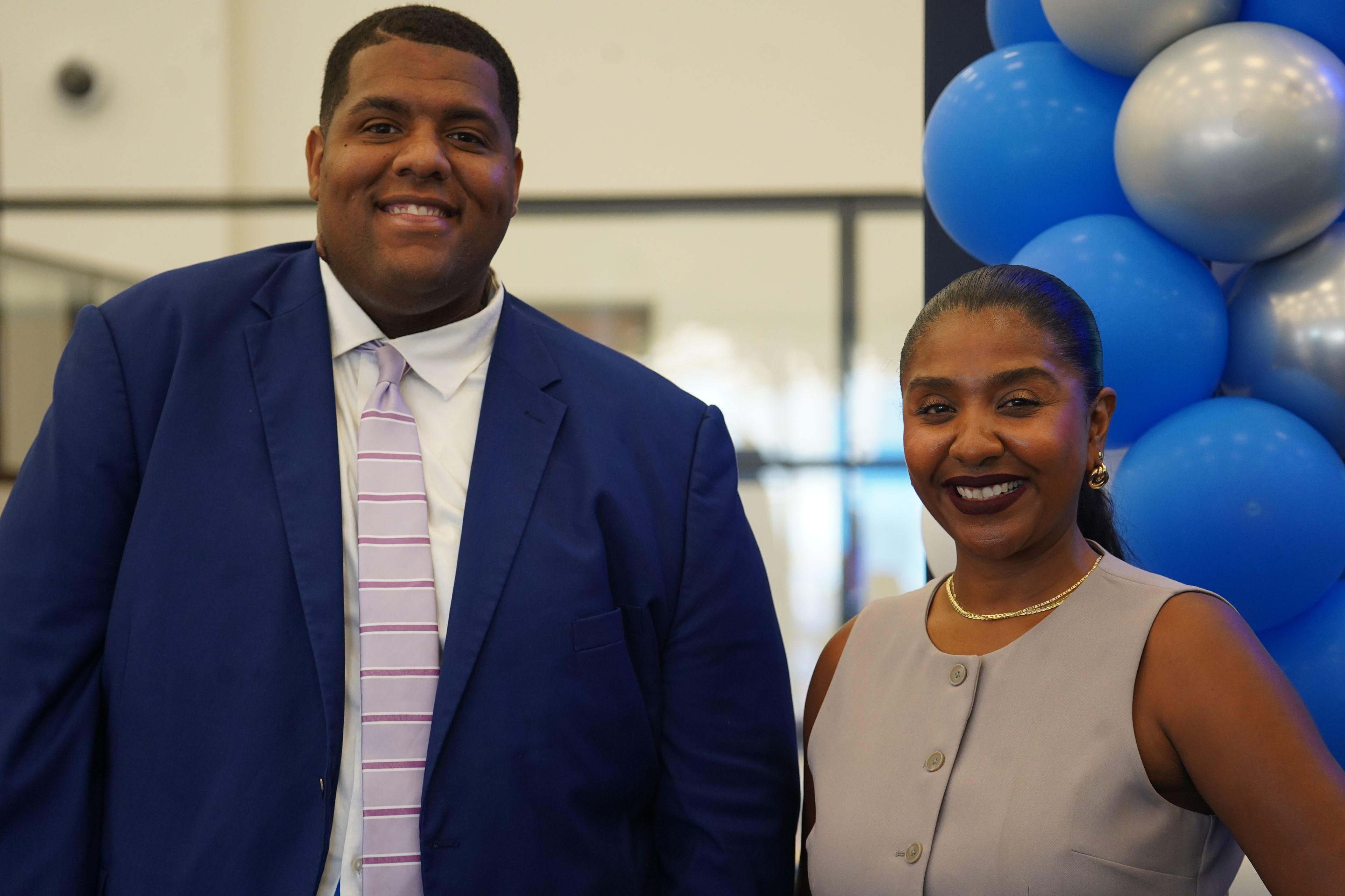 Evan Moore, left, JPMorgan Chase&rsquo;s Modesto community manager, and Andrea Andrade, the company&rsquo;s vice president and community manager for Stockton and San Joaquin County, pose for a portrait Aug. 4 at JPMorgan Chase CEO Jamie Dimon&rsquo;s 16th annual summer bus tour Aug. 4. 