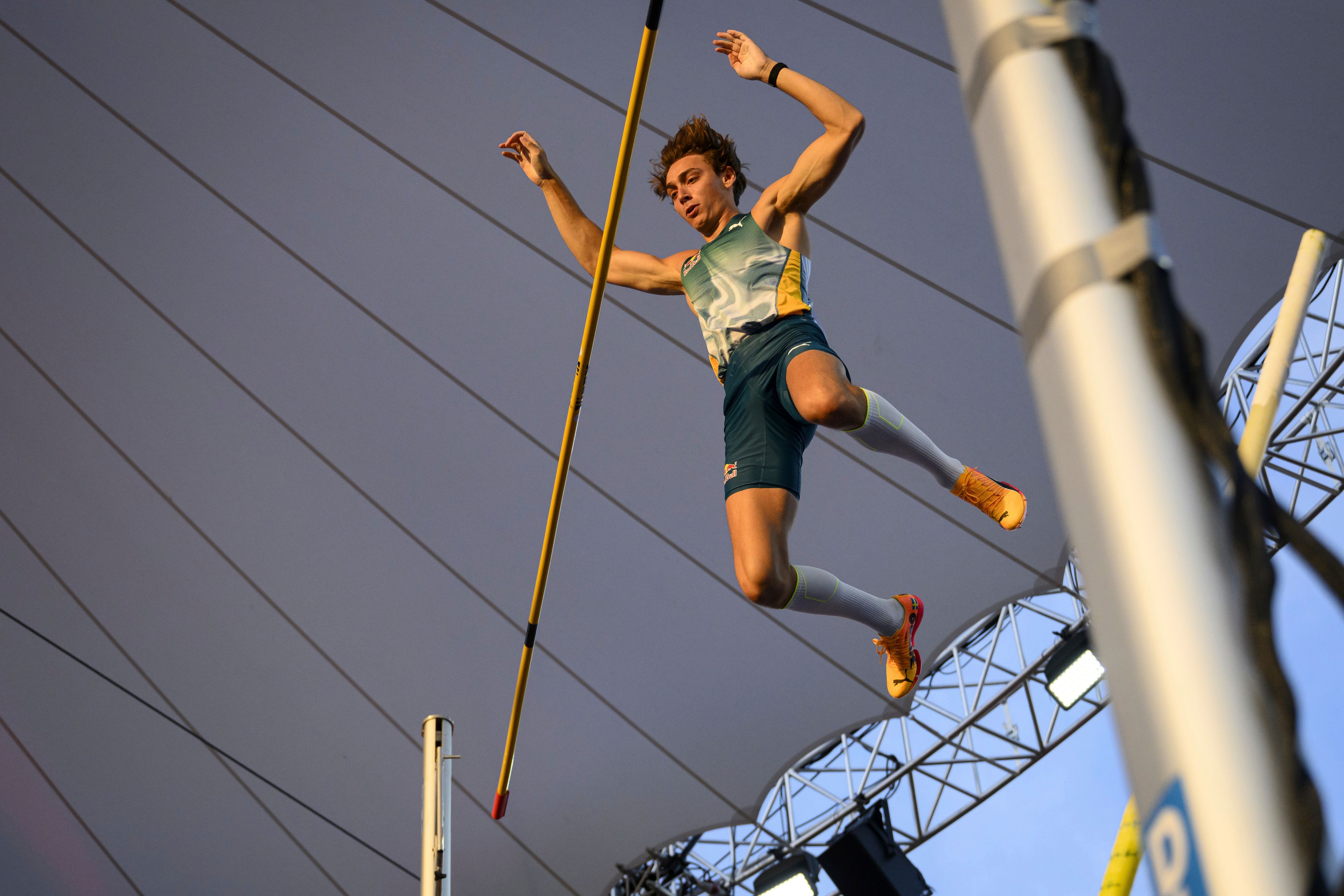 Armand Duplantis, of Sweden competes during the men's pole vault competition at the World Athletics Diamond League Athletissima City event athletics meeting, in Lausanne, Switzerland, Wednesday, Aug. 21, 2024. (Jean-Christophe Bott/Keystone via AP)