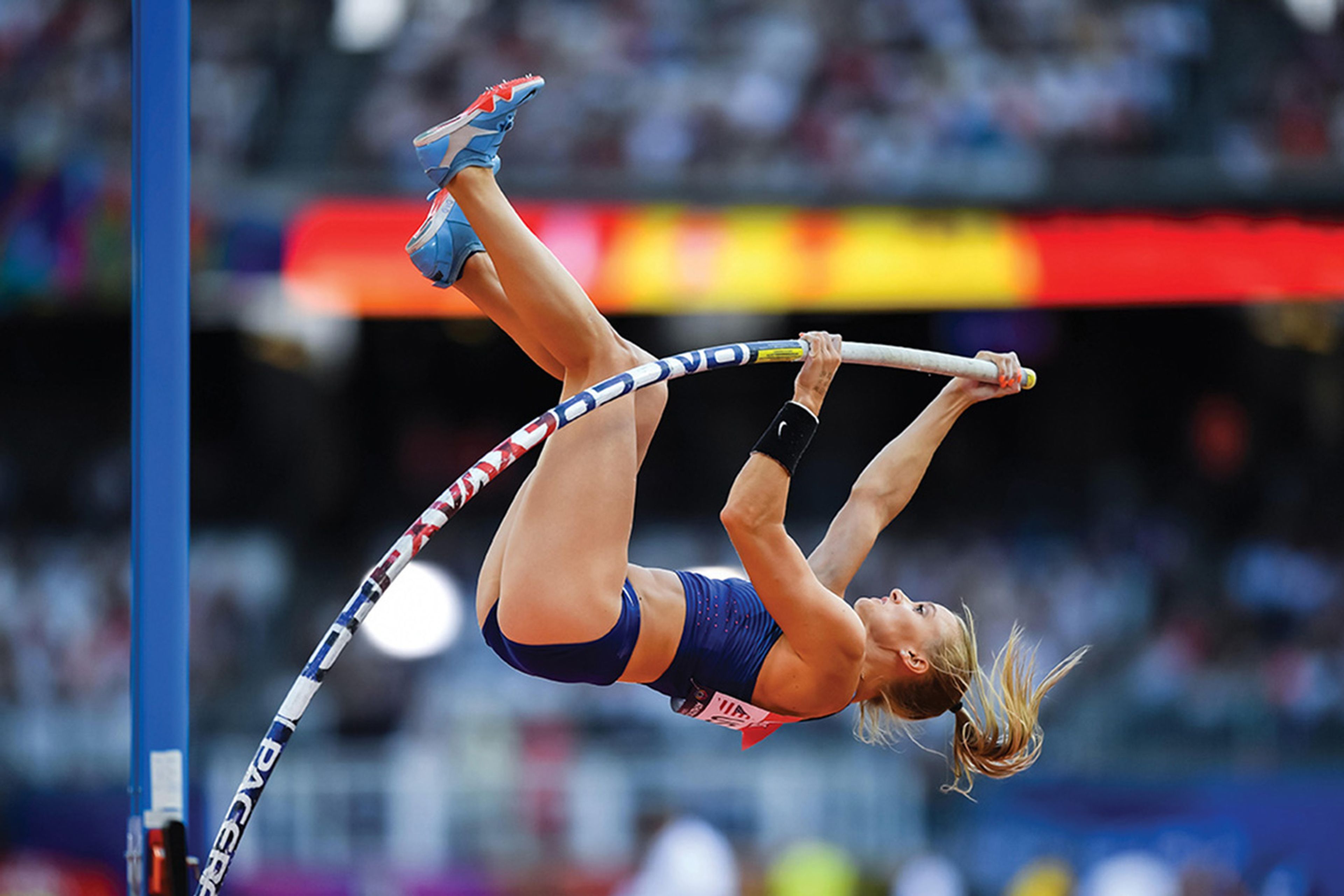 A vaulter goes up on a Gill Pacer Carbon pole vaulting pole. 