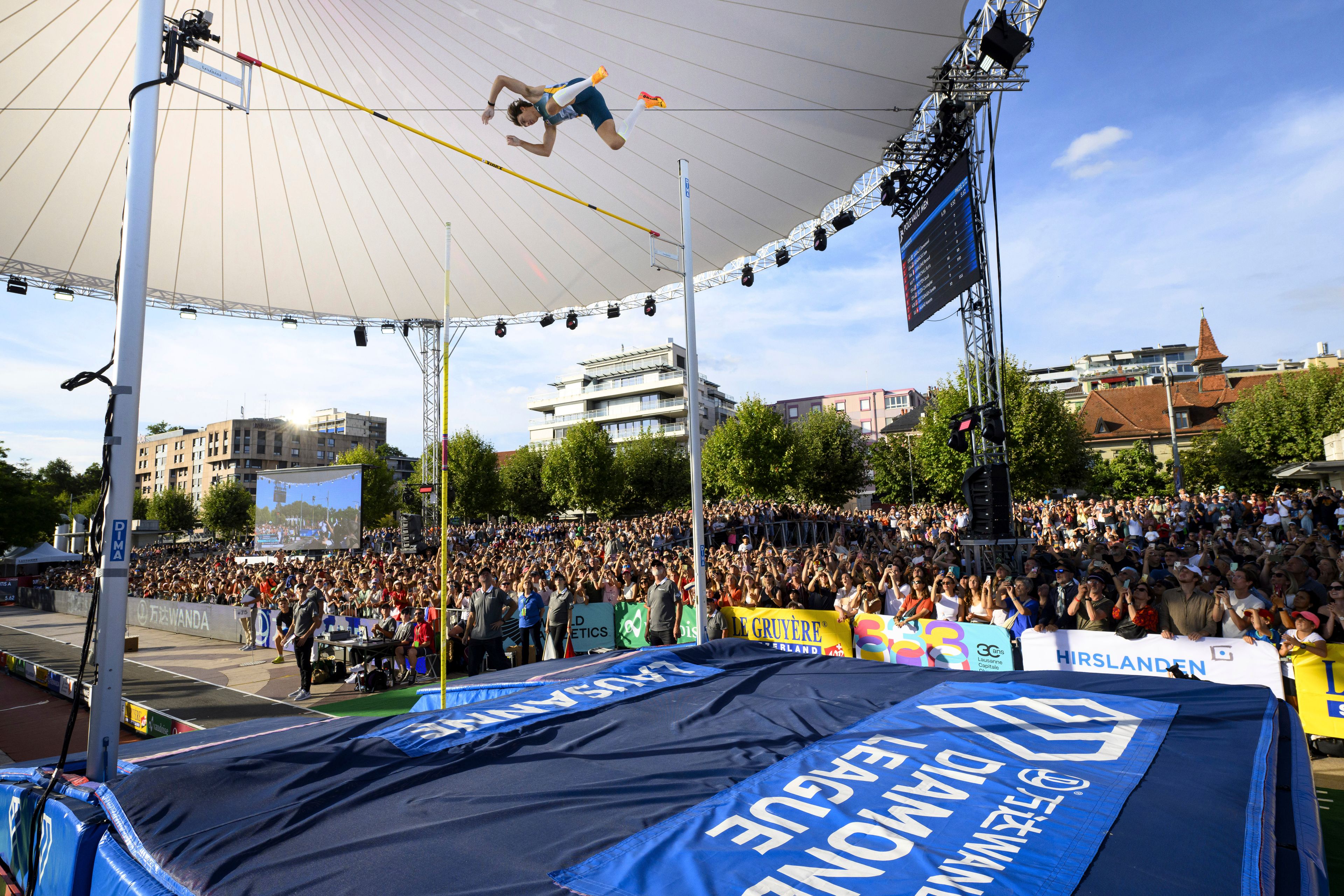 Armand Duplantis, of Sweden competes during the men's pole vault competition at the World Athletics Diamond League Athletissima City event athletics meeting, in Lausanne, Switzerland, Wednesday, Aug. 21, 2024. (Jean-Christophe Bott/Keystone via AP)