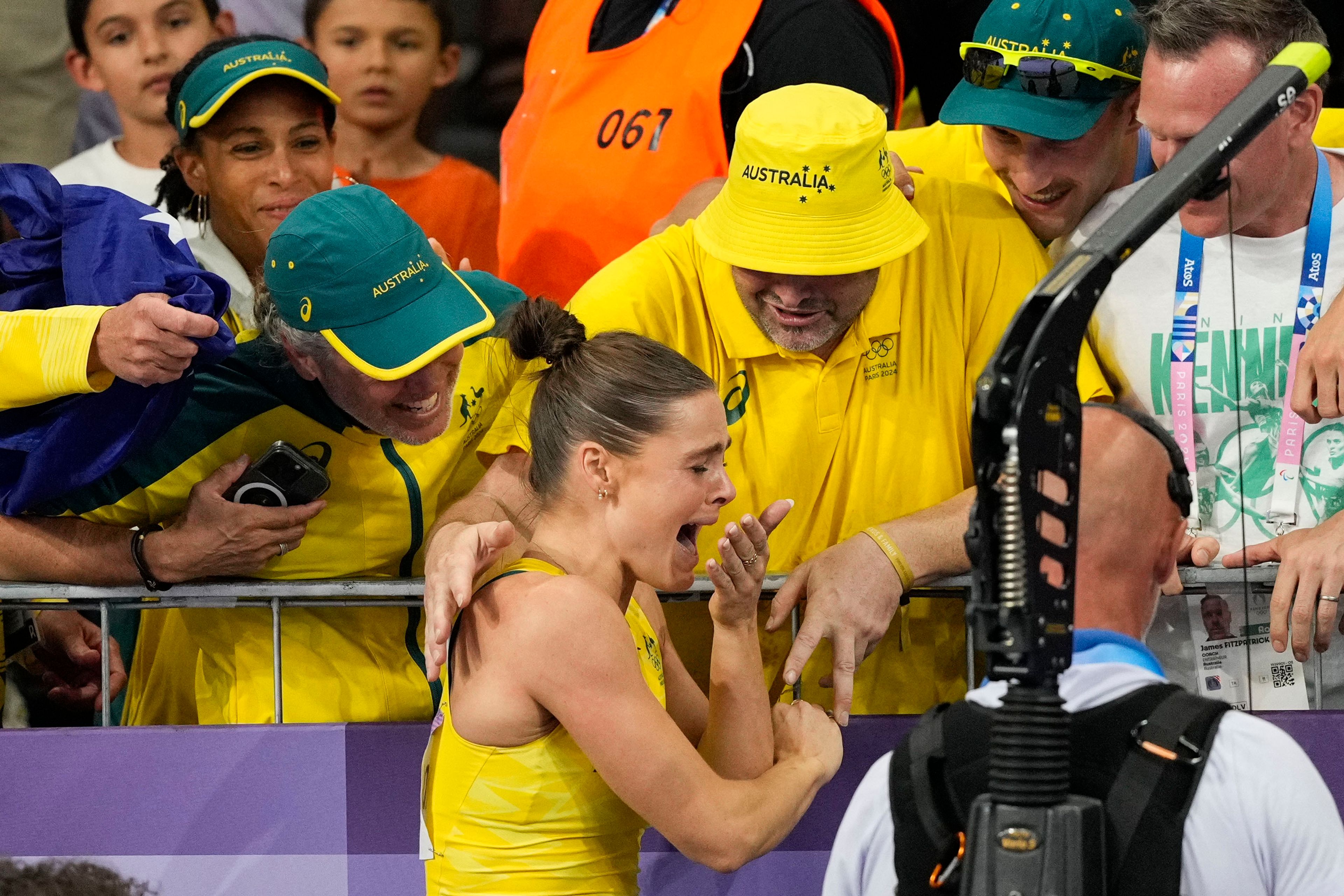 Nina Kennedy, of Australia, celebrates after winning the women's pole vault final at the 2024 Summer Olympics, Wednesday, Aug. 7, 2024, in Saint-Denis, France. (AP Photo/Bernat Armangue)