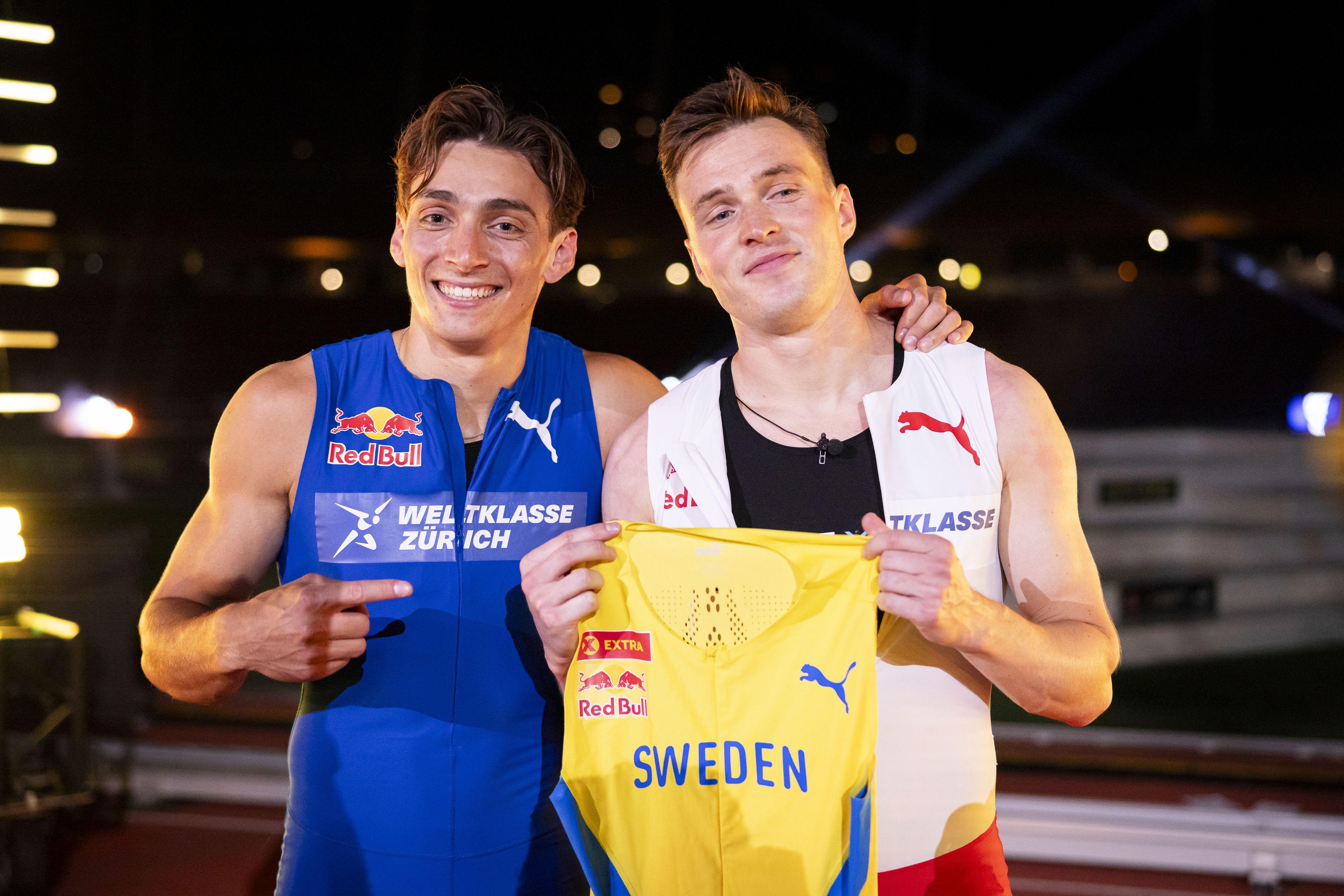 Armand Duplantis, left, of Sweden, and Karsten Warholm of Norway pose after the men's 100 meters sprint at the IAAF Diamond League Athletics meet, Wednesday, Sept. 4, 2024 in Zurich, Switzerland. (Keystone, Michael Buholzer/via AP)